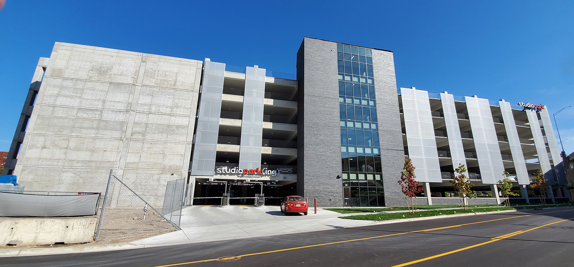 A wide view of the structure showing the facade panels in context.
