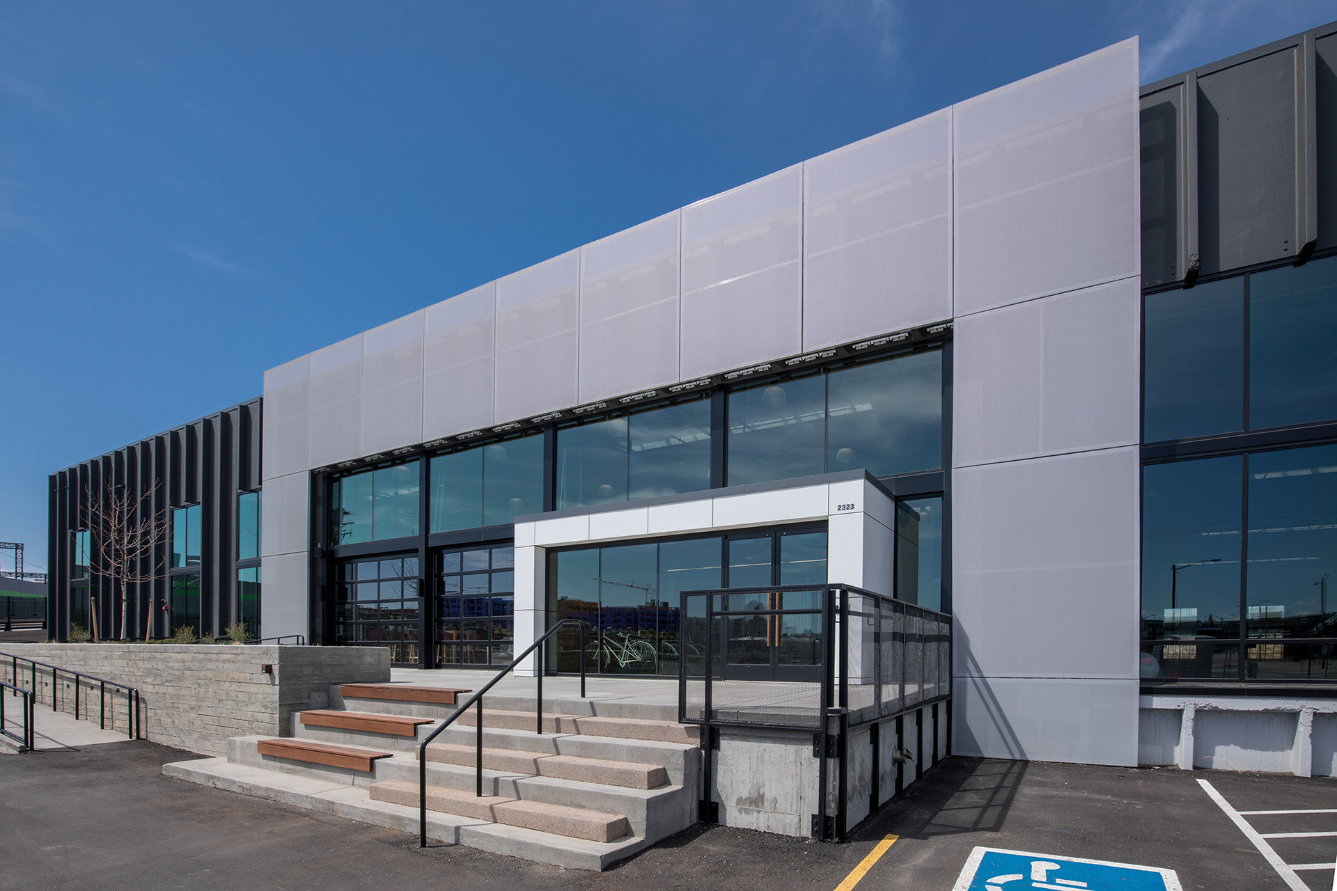 A view of the facade in the daytime showing a drastically different look.