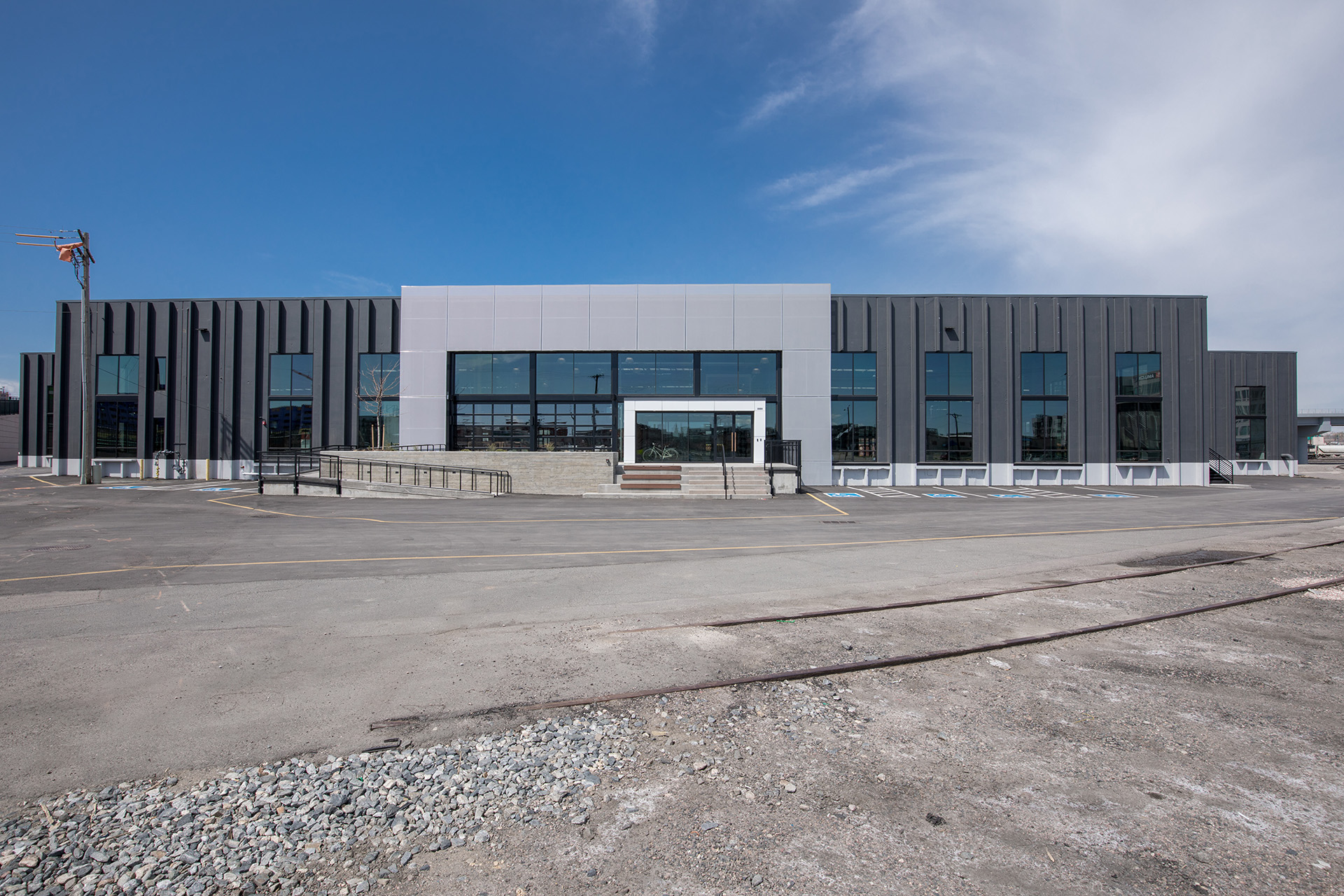 A wide shot of the entire building showing the facade in context.