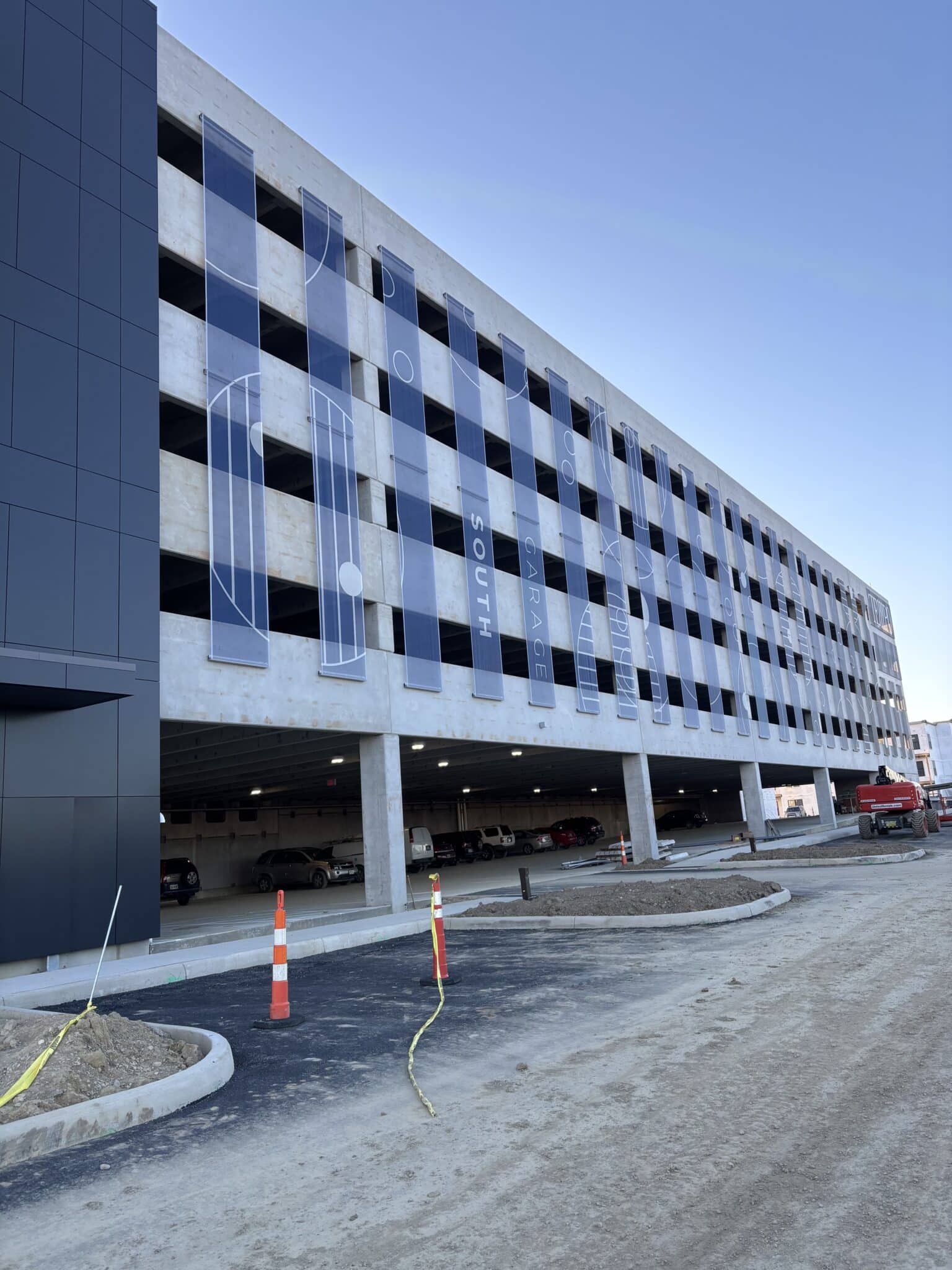 Wide view of the garage showing how long the facade panels stretch.