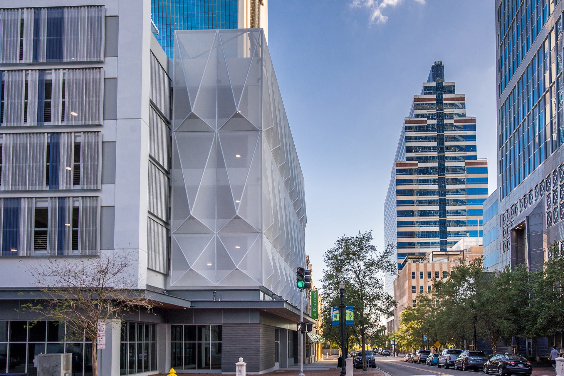 A wide view of the structure showing both facades in context with each other.