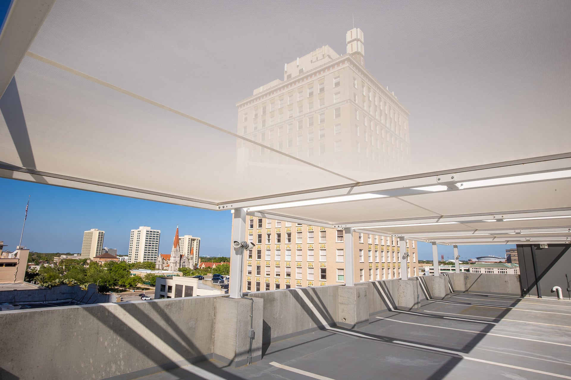 A view of the roof screen on top of the parking garage.