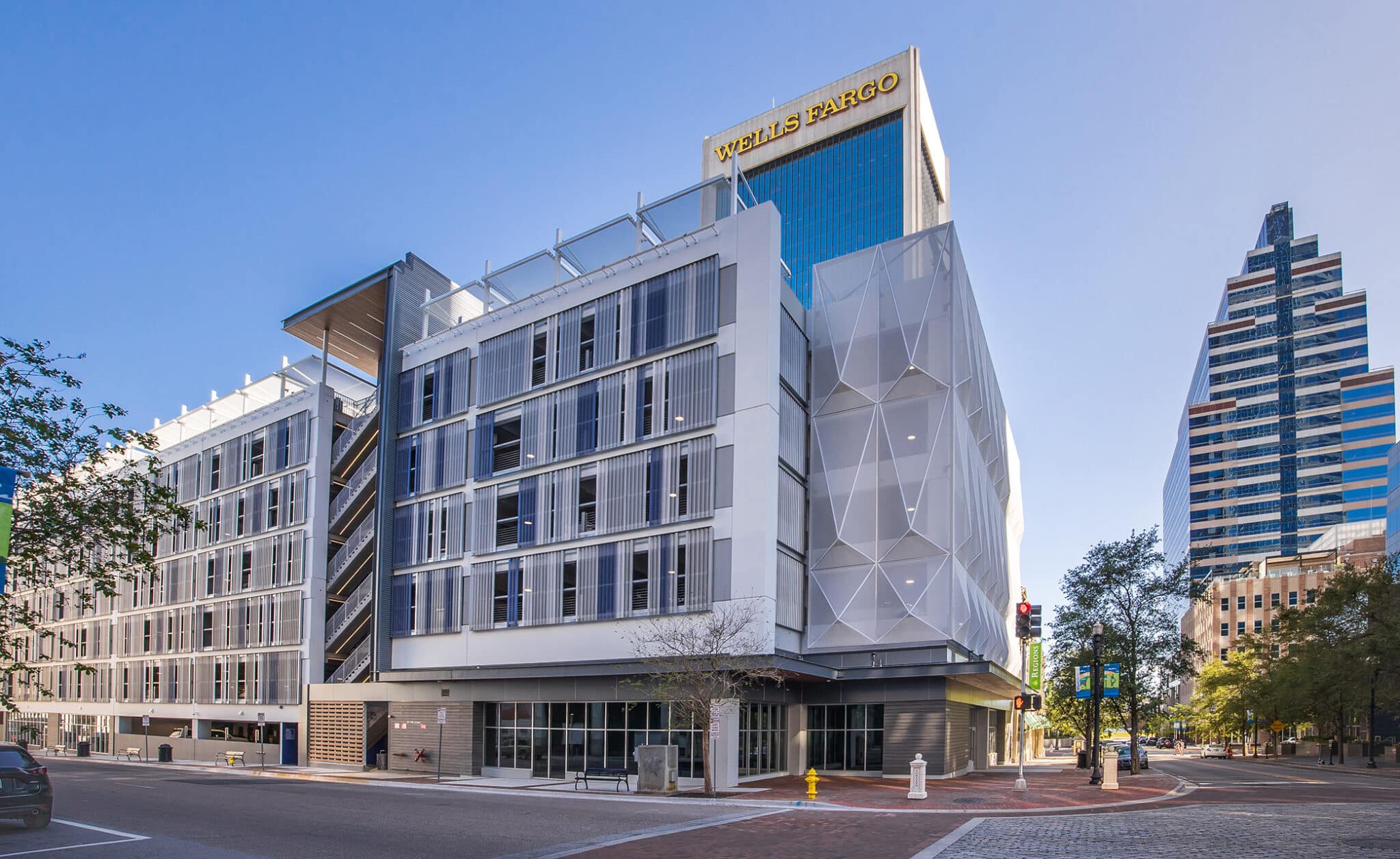 Another view of the blue and white slotted facade.