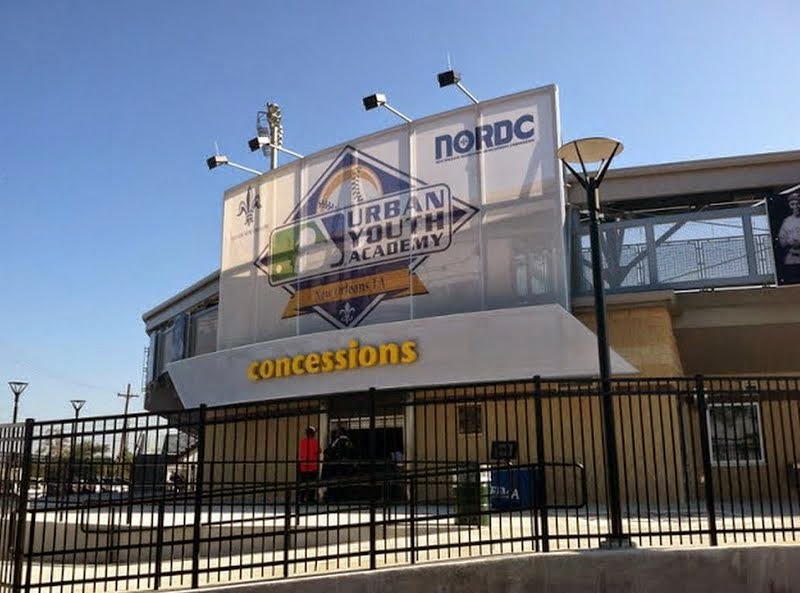 A wide image that shows the full facade in context with the structure.