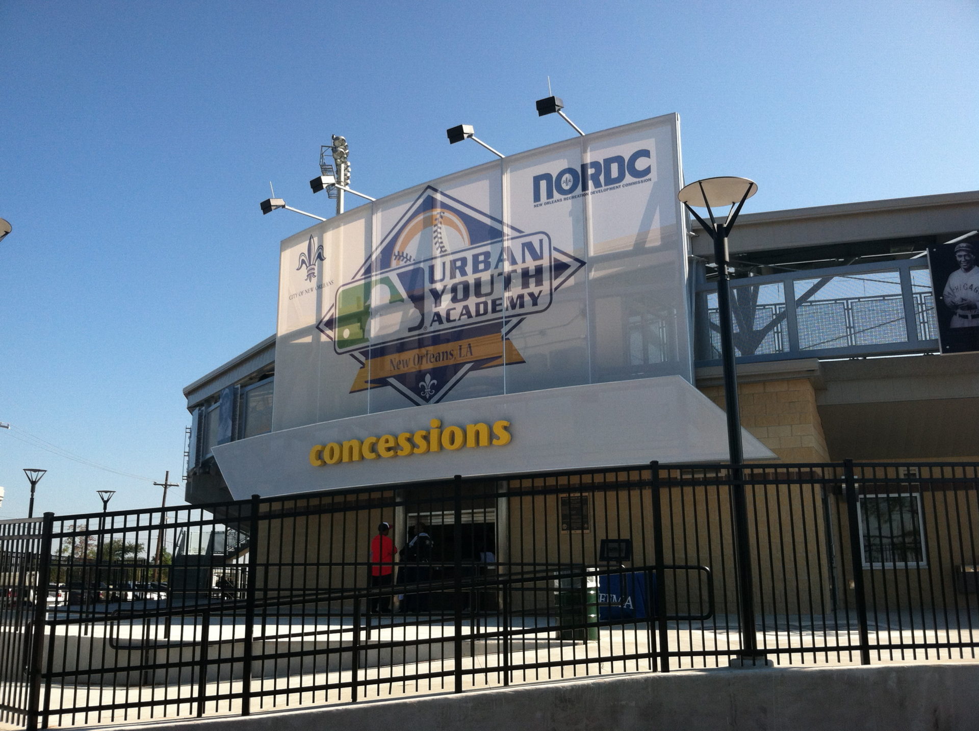 A wide image that shows the full facade in context with the structure.