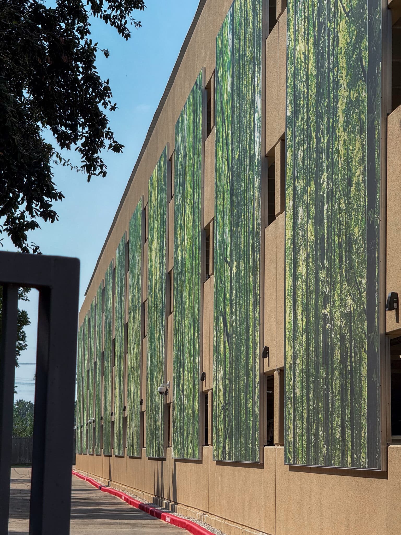 A full view of the facade showing a large quantity of panels.