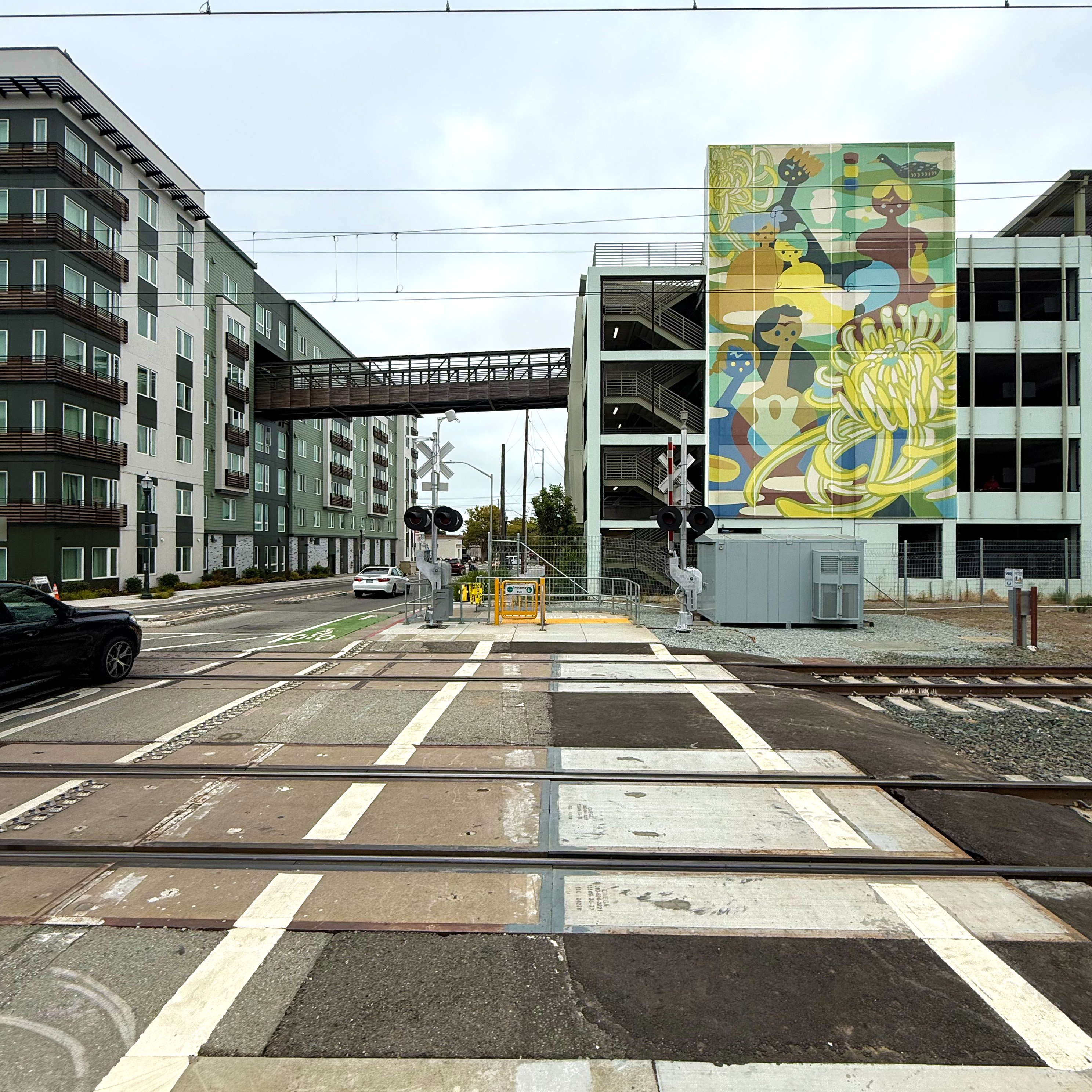 A graphic facade featuring a bunch of people depicting a sense of community.