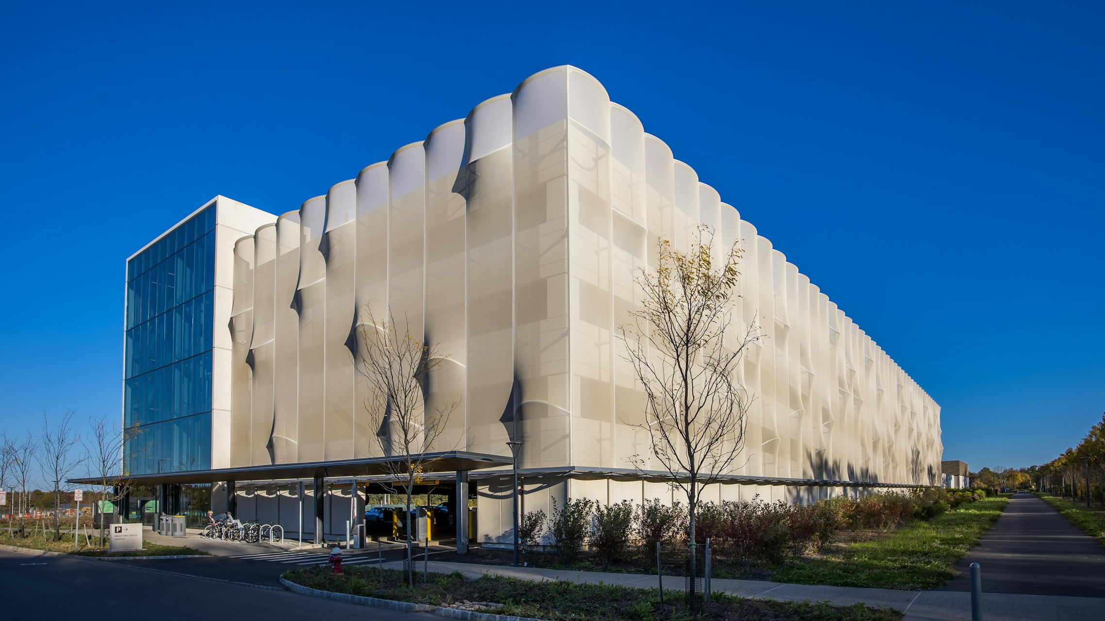 A wide shot of the facade that showcases how the 3D elements cast a variety of shadows to change the look and feel of the facade.