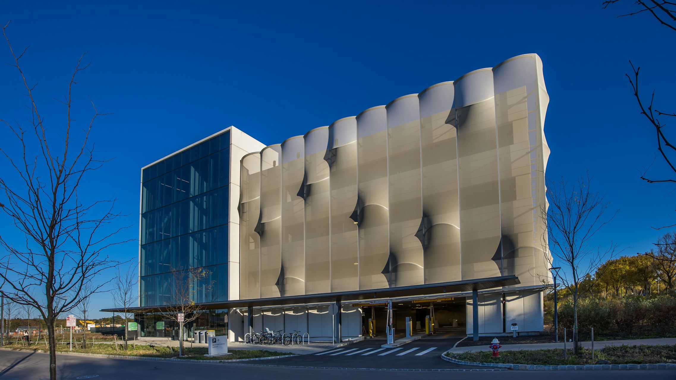 A wide shot of the facade that showcases how the 3D elements cast a variety of shadows to change the look and feel of the facade.