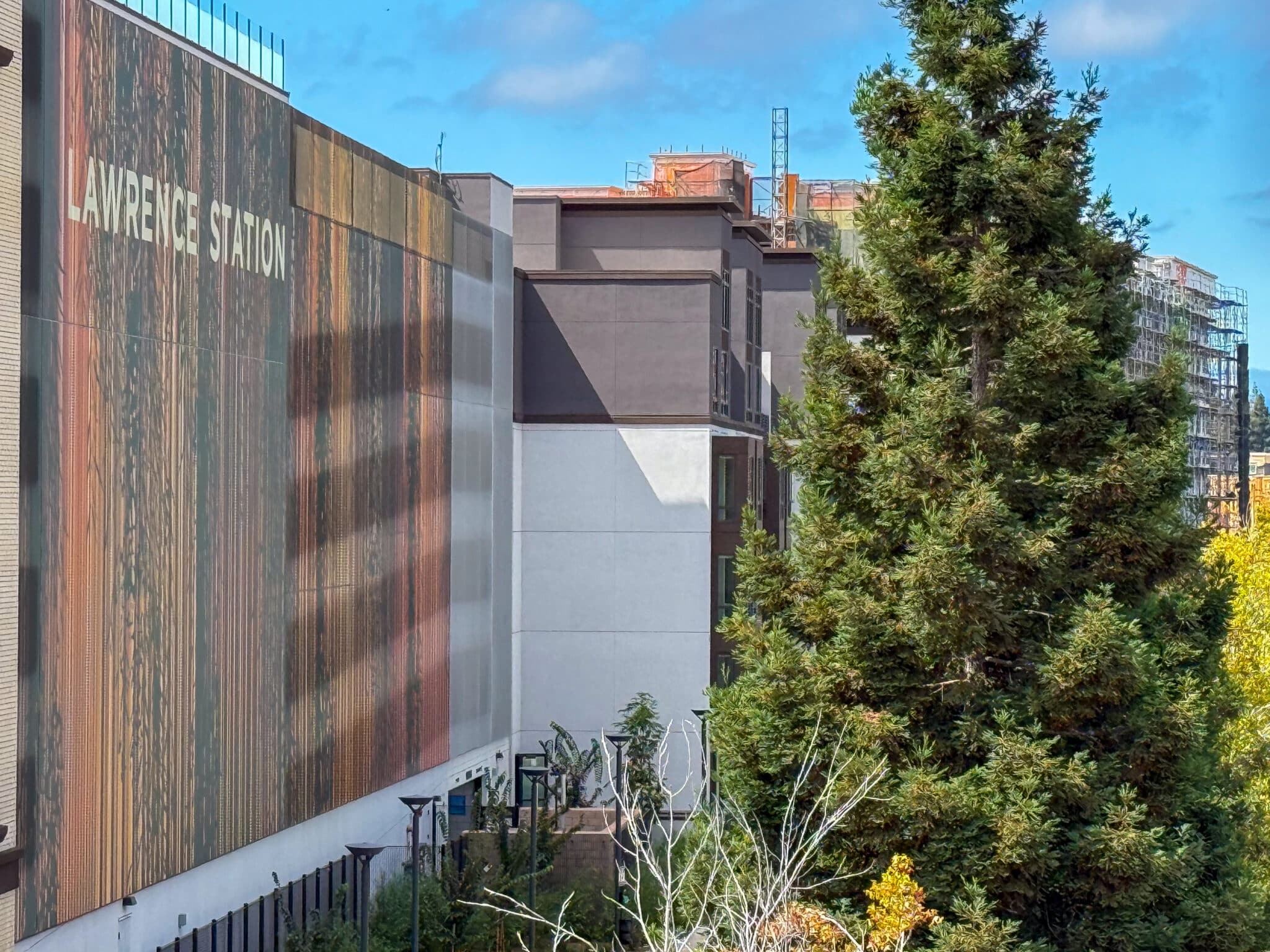 A wide view of the parking structure that shows the facade in context.