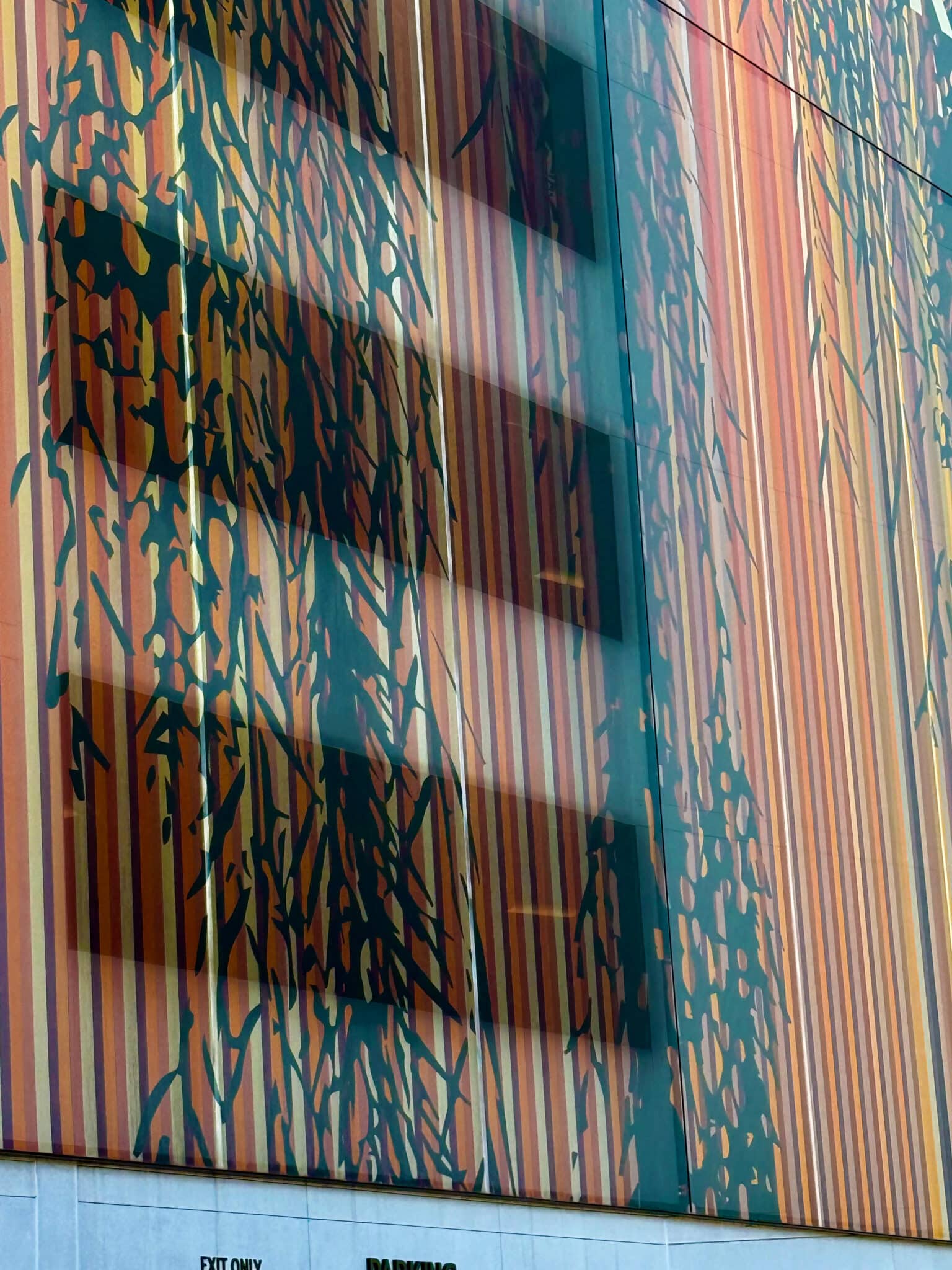 A close up of the graphic facade showcasing the material and how the design is printed on it.