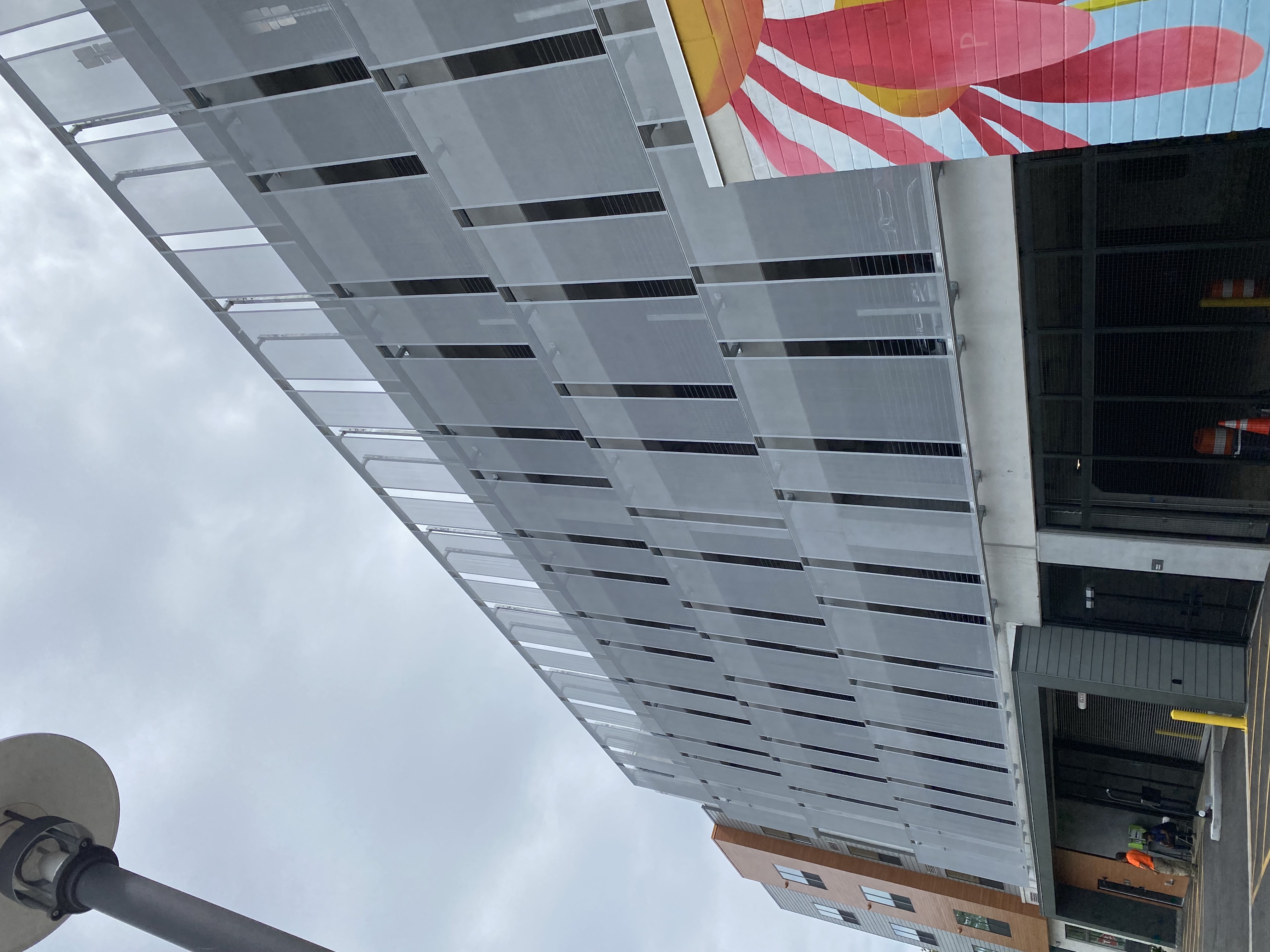 A wider view of the slotted sidewalk facade.