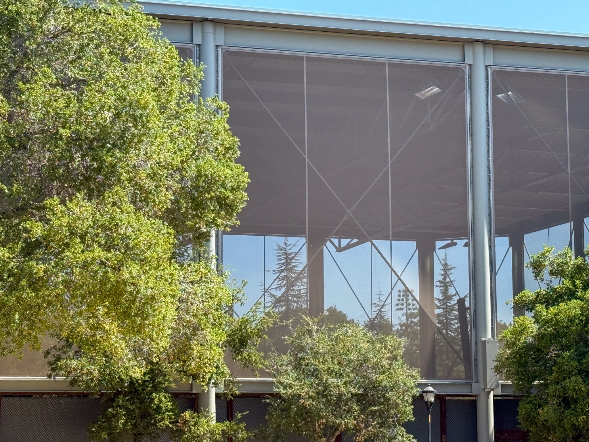 A view of the facade from the exterior showcasing how you can see through the facades out to the other side of the structure.