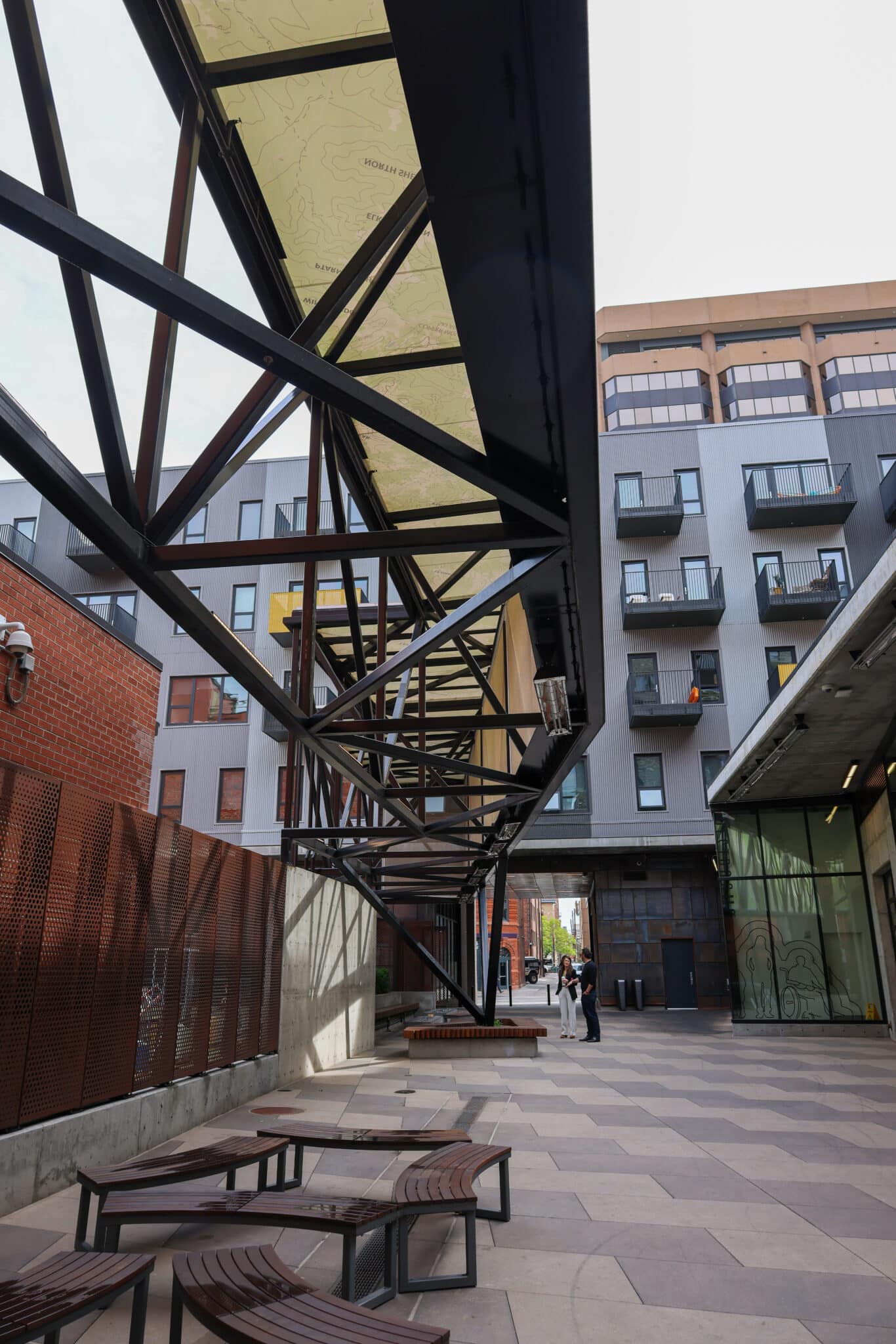 A view of the awnings from underneath, showcasing the steel framing.
