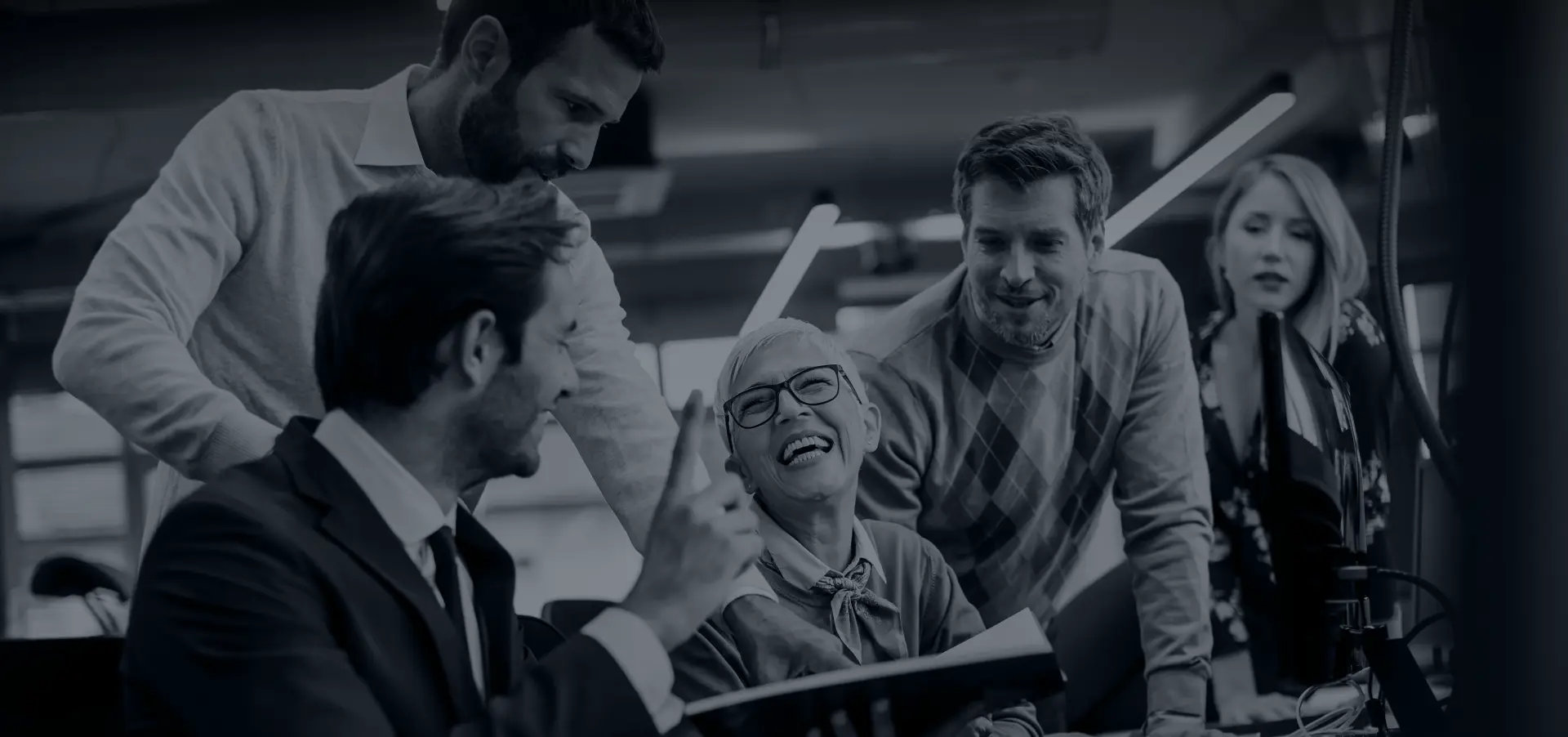 business people smiling and working closely together