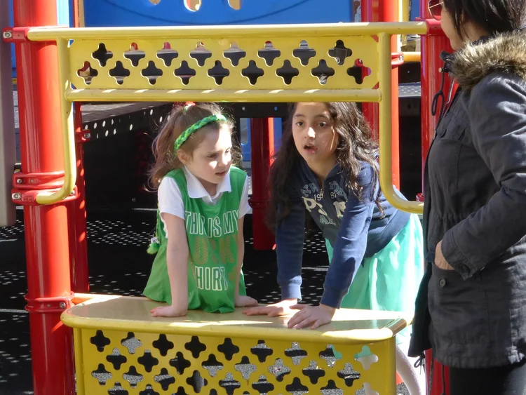 Children playing on a playground.