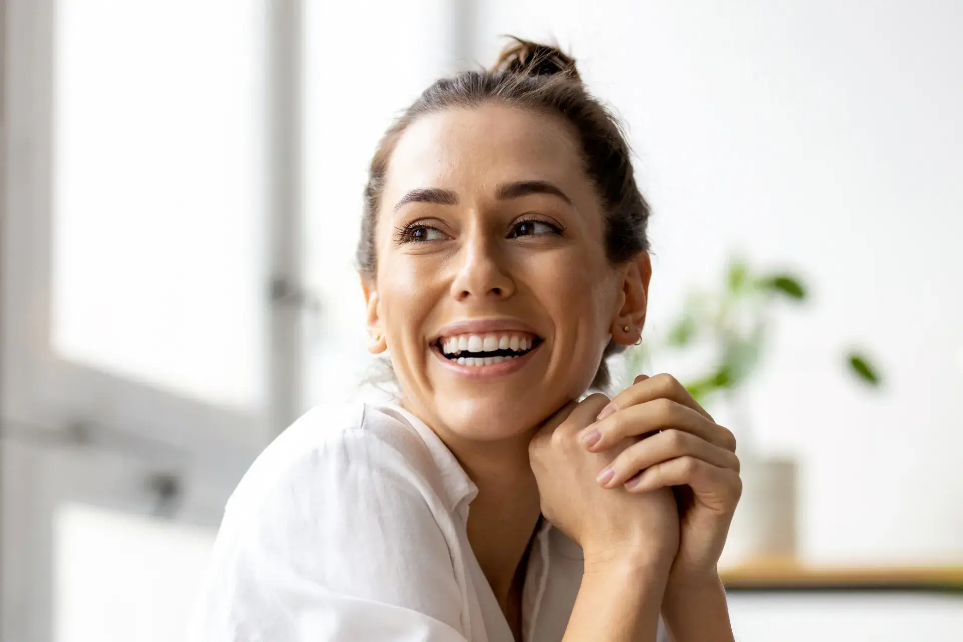a woman with a smile on her face