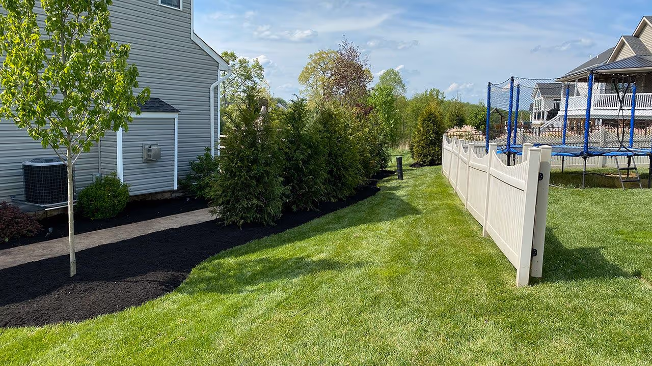 Landscape enhancement project with new plants and garden beds by DR Landscaping near me in Wexford and Cranberry Township PA