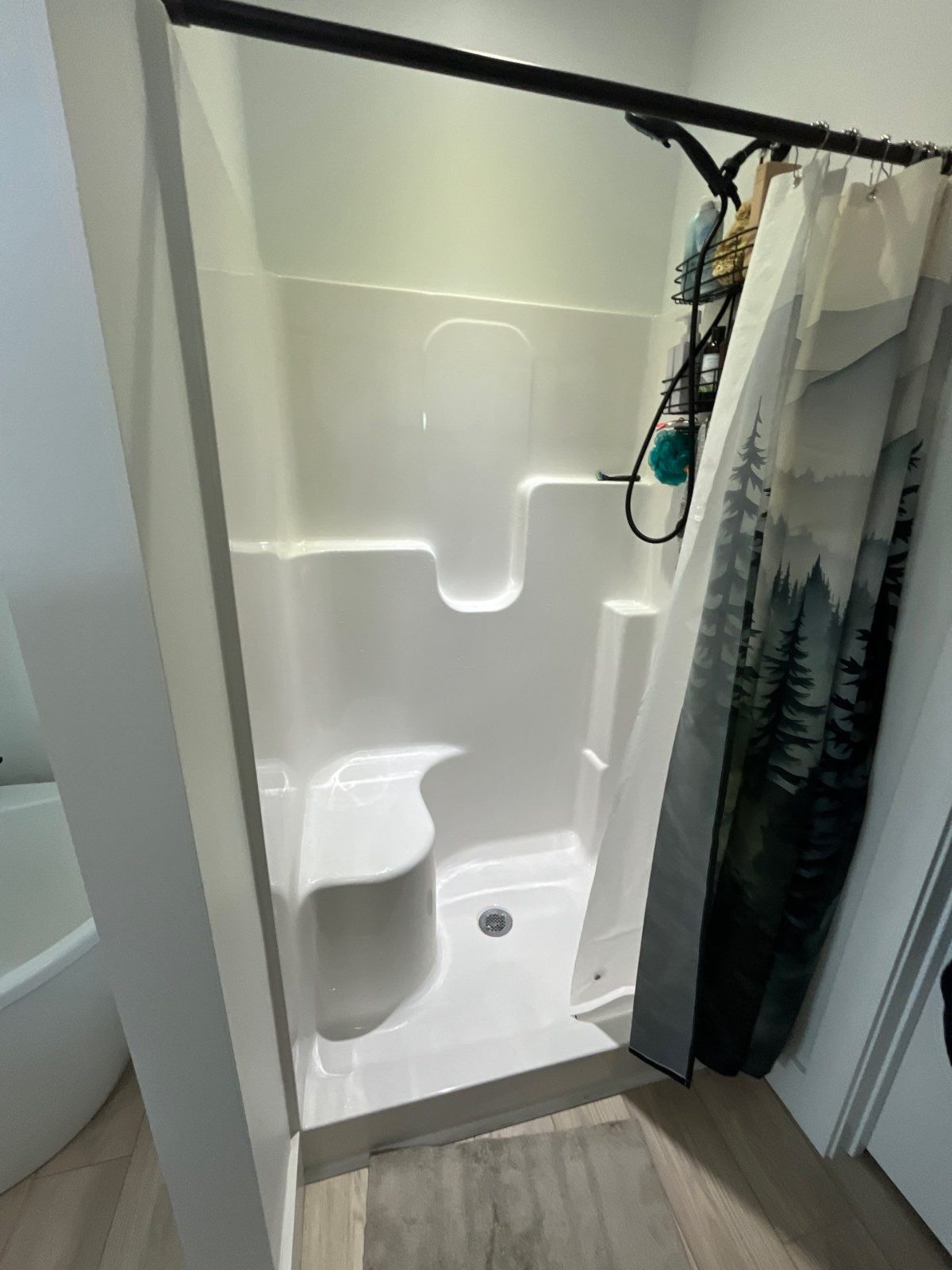 Before: the old shower before a Southern Showers shower replacement