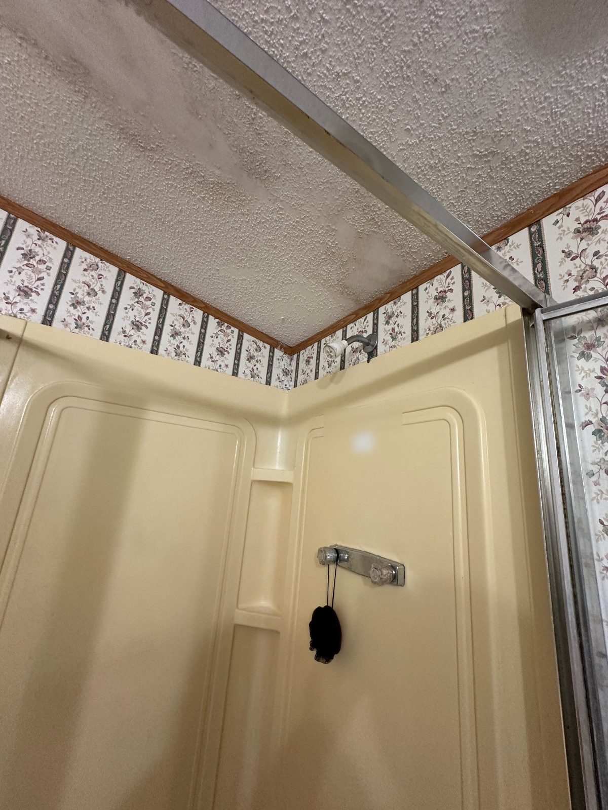 Before: the old shower before a Southern Showers shower replacement