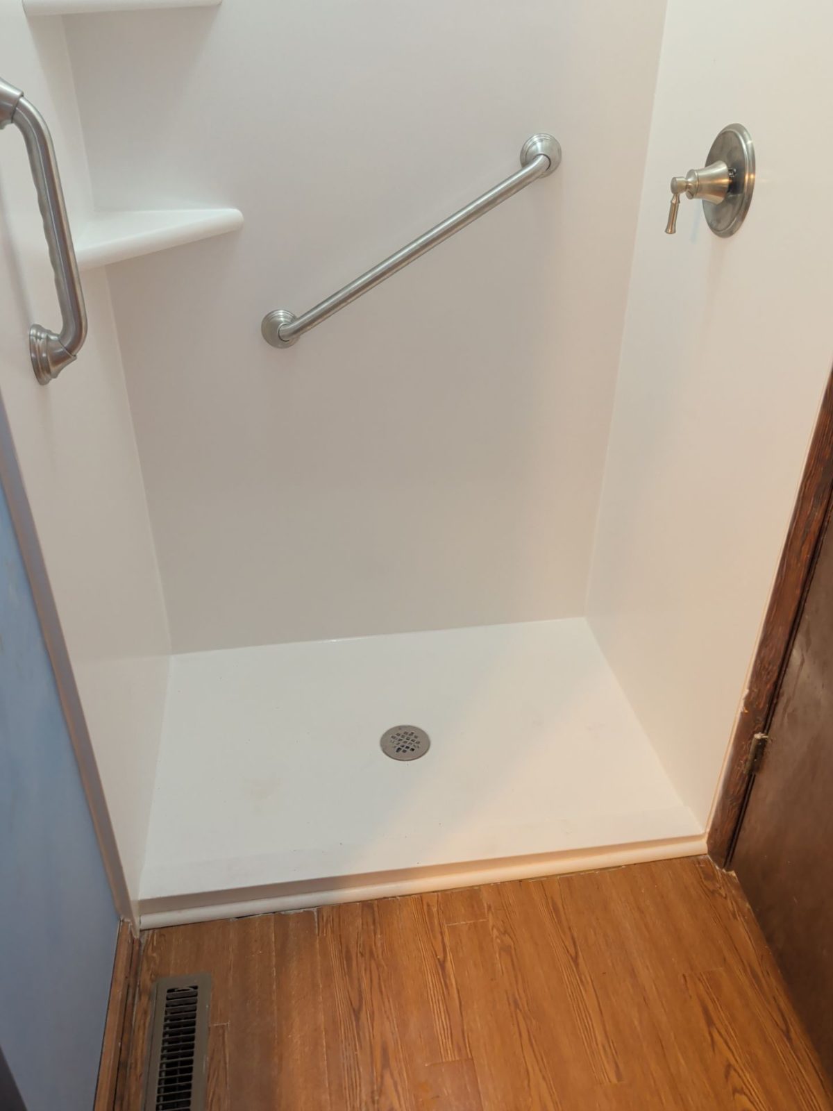 After: the new walk-in shower after a Southern Showers shower replacement