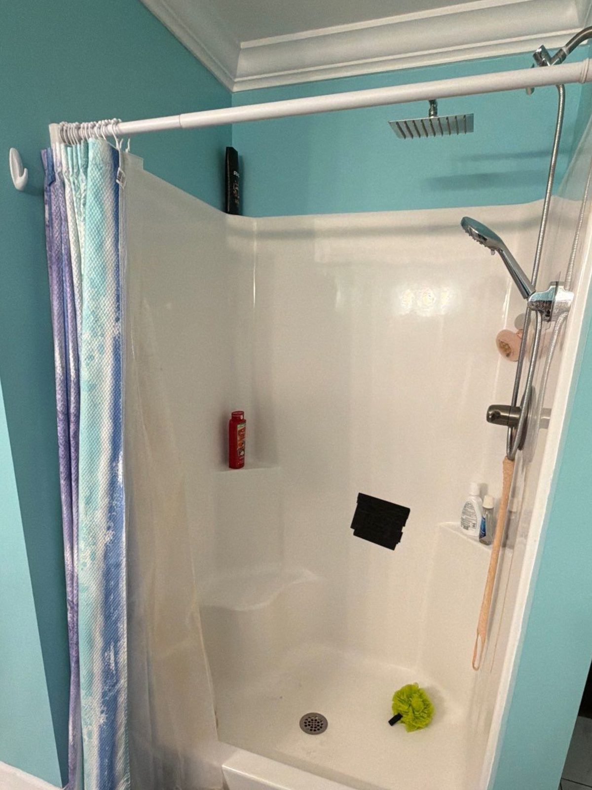 Before: the old shower before a Southern Showers shower replacement