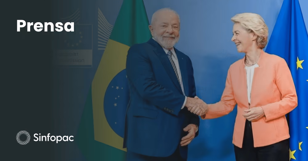 Apretón de manos de líderes internacionales y banderas de la Unión Europea y Brasil