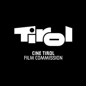 Logo von Cine Tirol Film Commission mit weißem Schriftzug auf schwarzem Hintergrund.