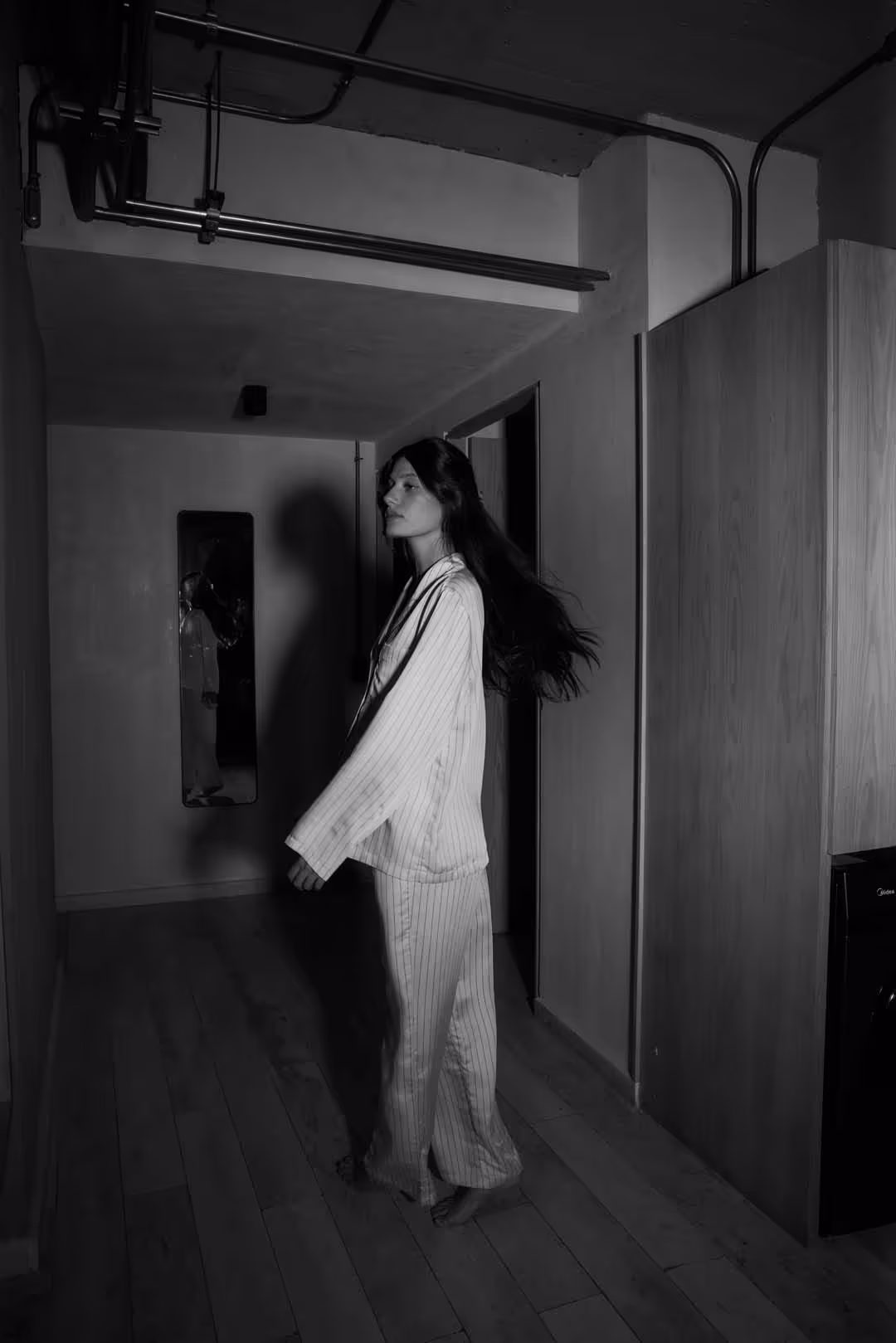 lady in a room at Caliza Roma, Mexico City