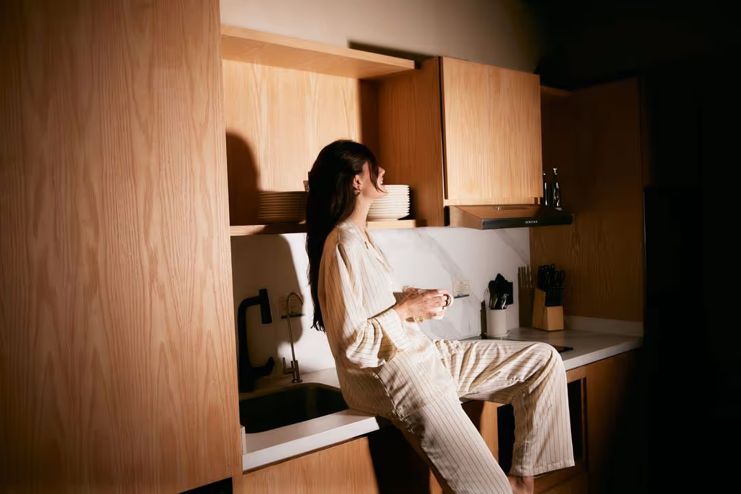 lady in a kitchen at Caliza Roma, Mexico City