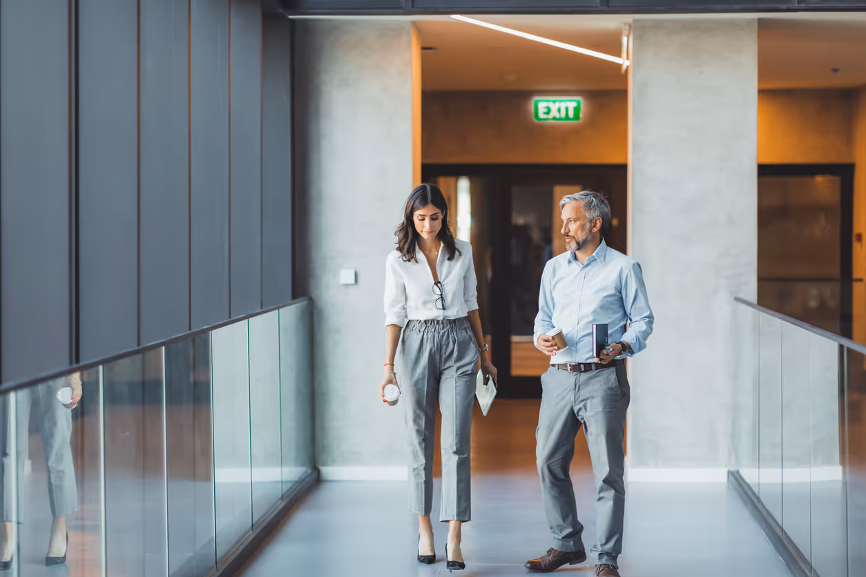 image of a notebook and a coffee cup on a desk