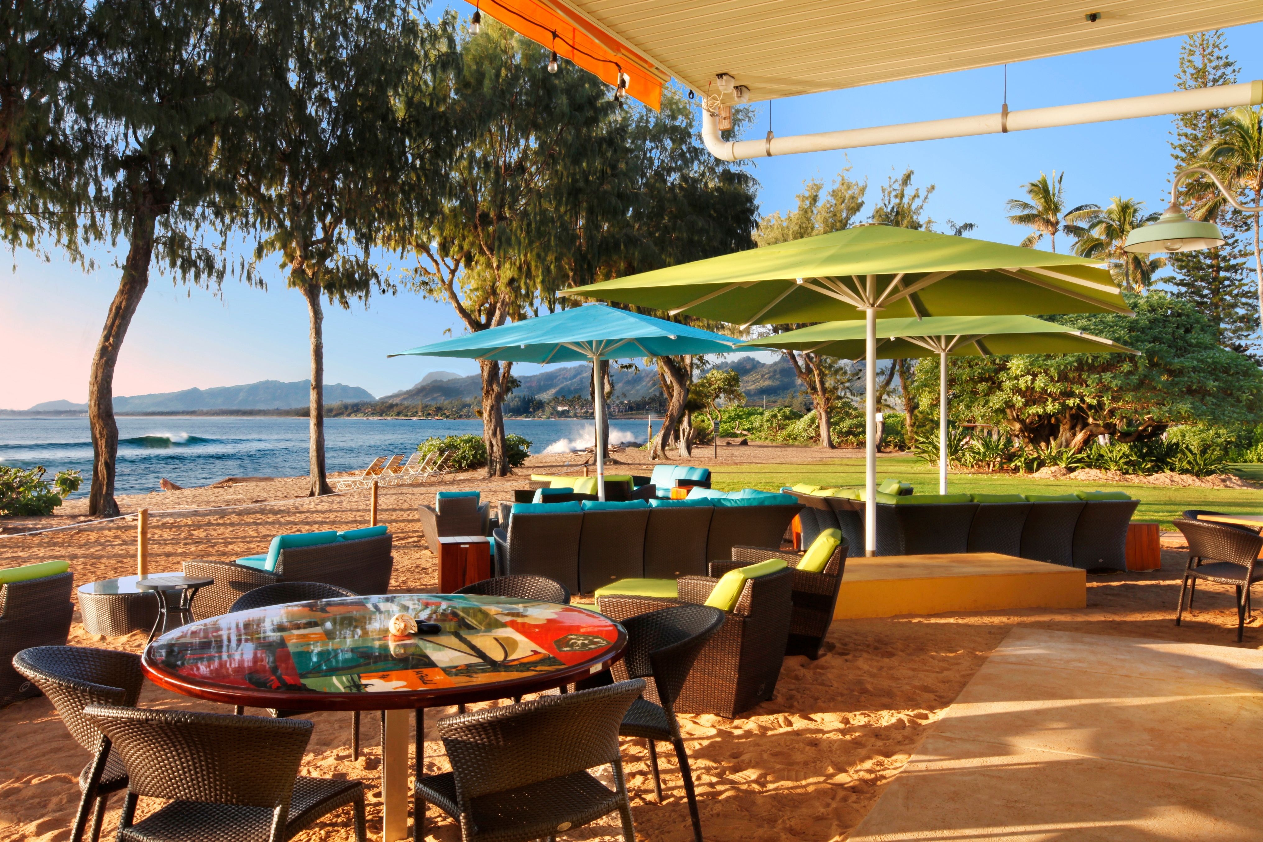 Morning light shining on outdoor sitting area of Lava Lava Beach Club