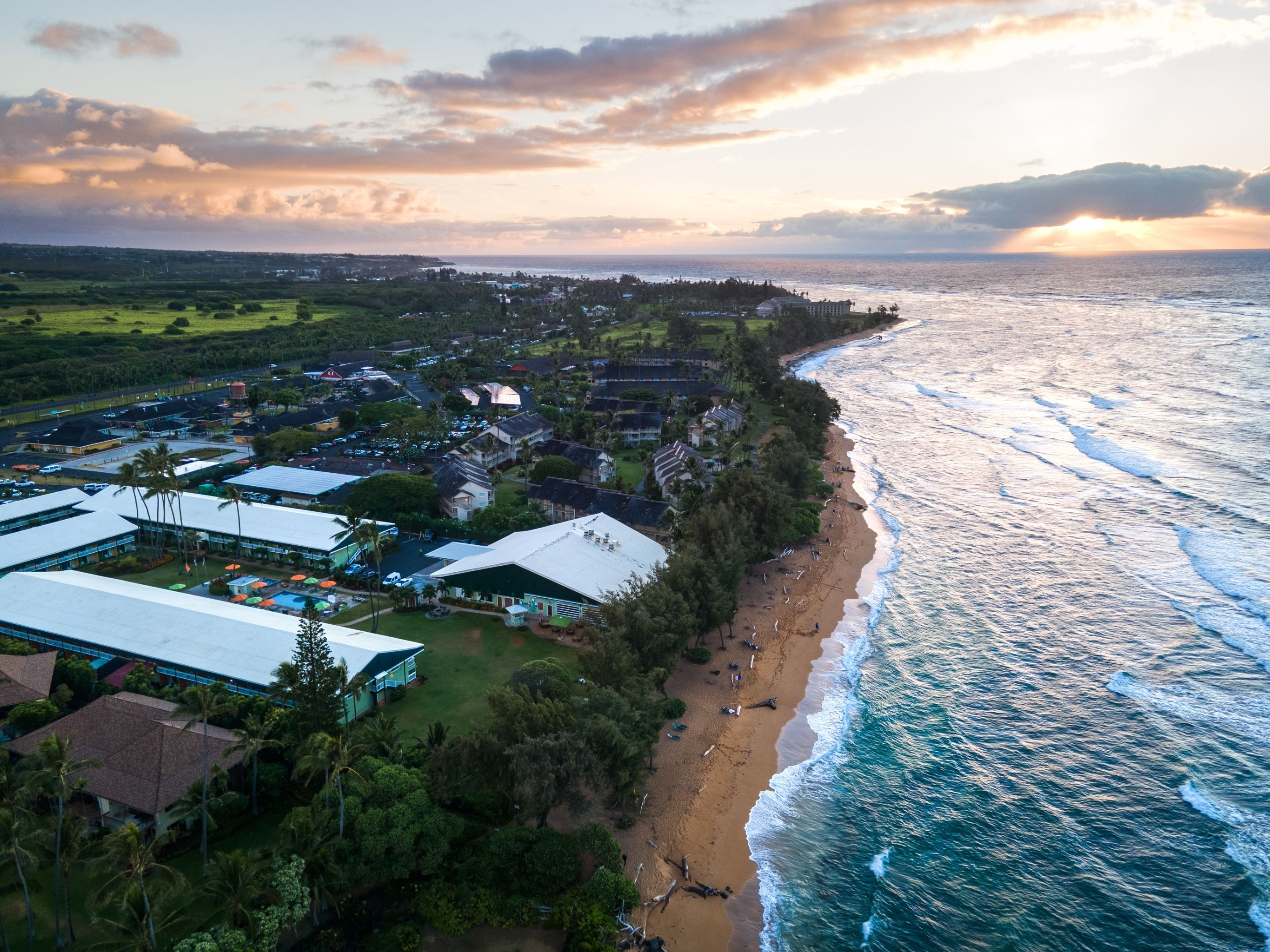 Aerial view with Kauai Shores Hotel in the foreground and Coconut Marketplace in the background to the left