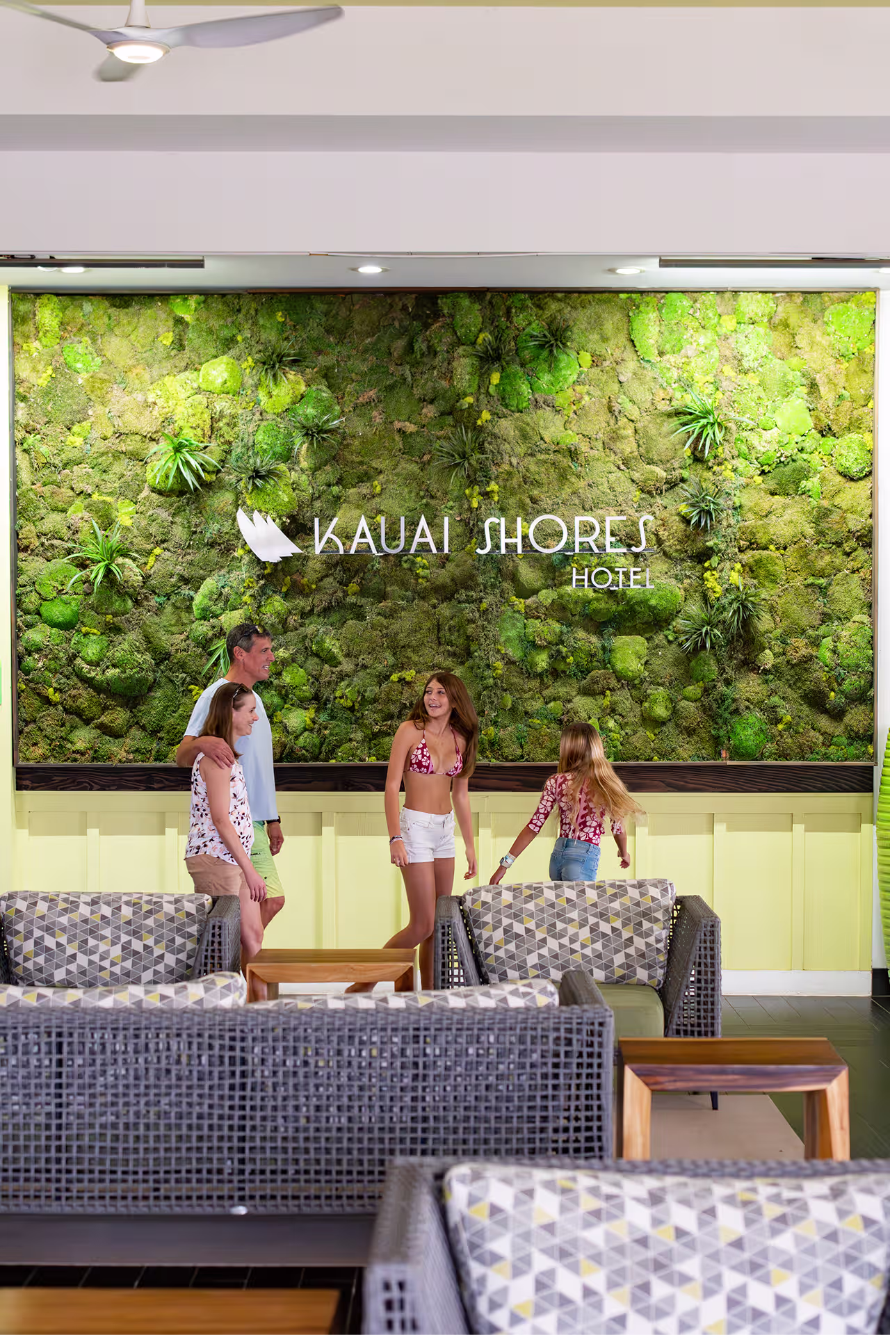 Open-air lobby at Kauai Shores Hotel with tropical plants