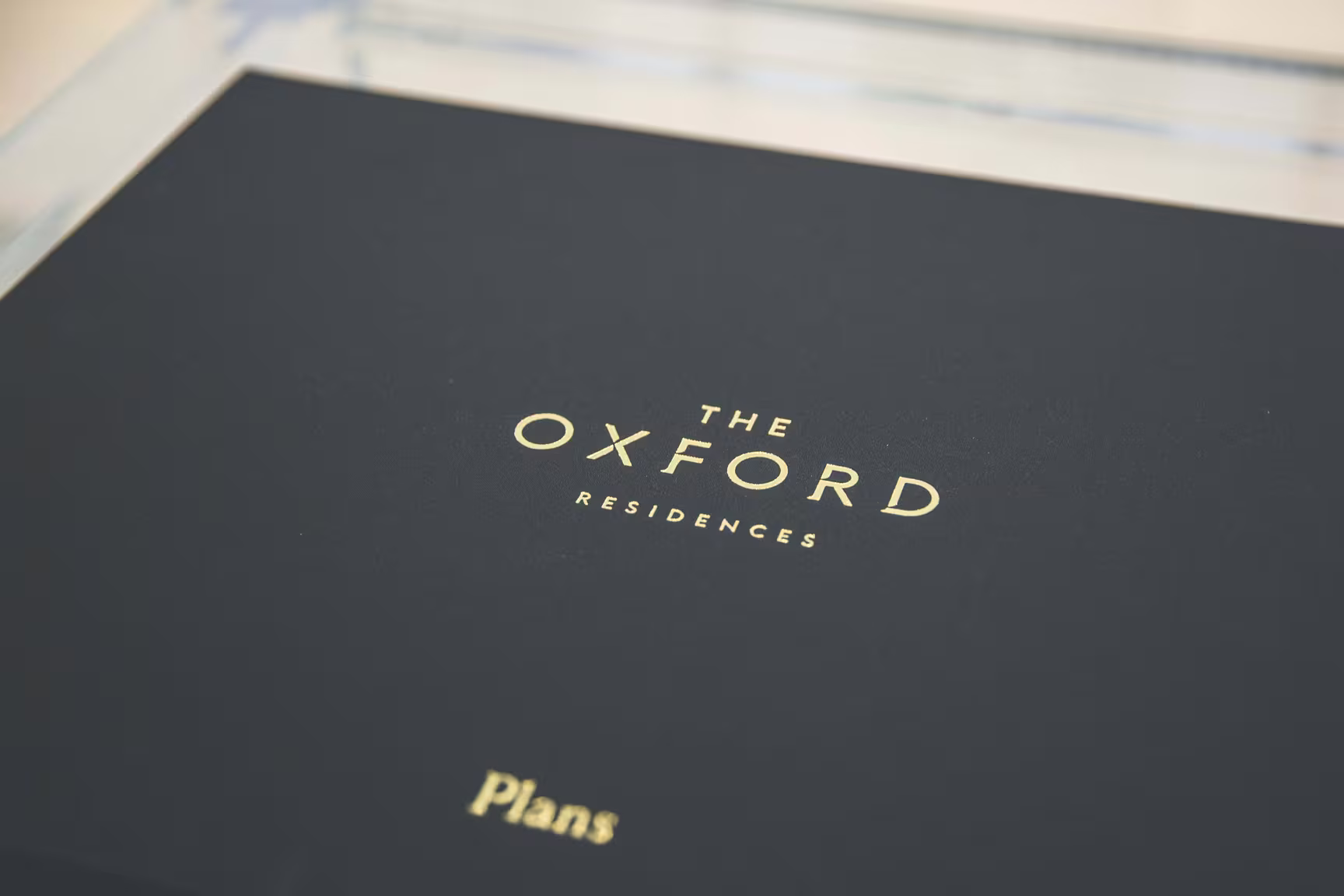 Pamphlet ofThe Oxford on table