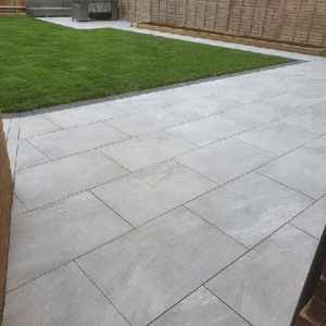 Large paved patio beside lawn – Lancashire