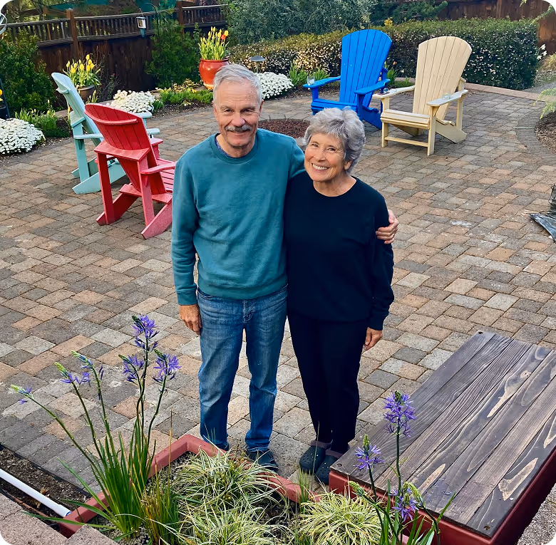 A man and a woman standing next to each other.