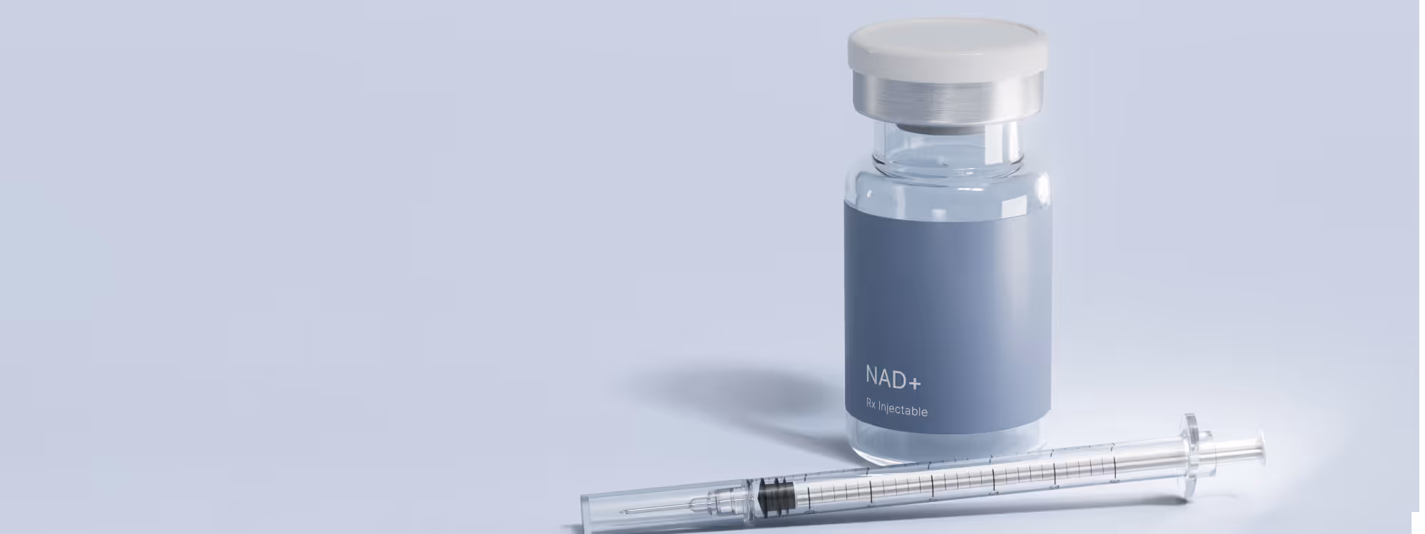 Vial labeled 'effecty. NAD+ Rx Injectable' with a syringe lying in front of it on a light surface.