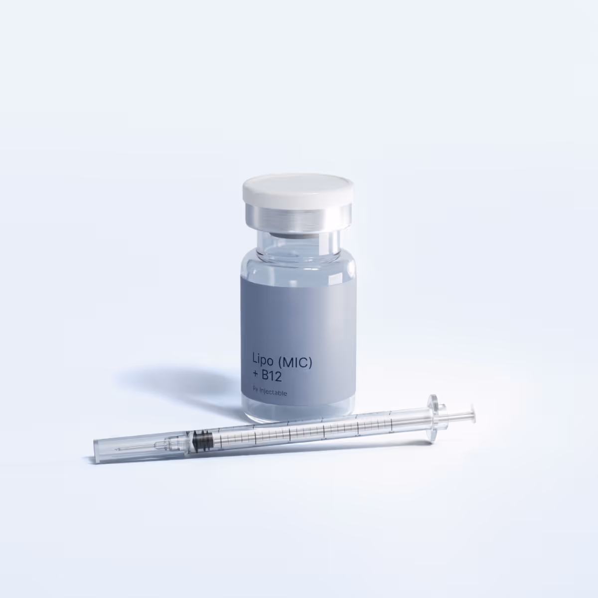 Clear vial labeled 'effecty Lipo (MIC) + B12' next to a transparent syringe on a white background.