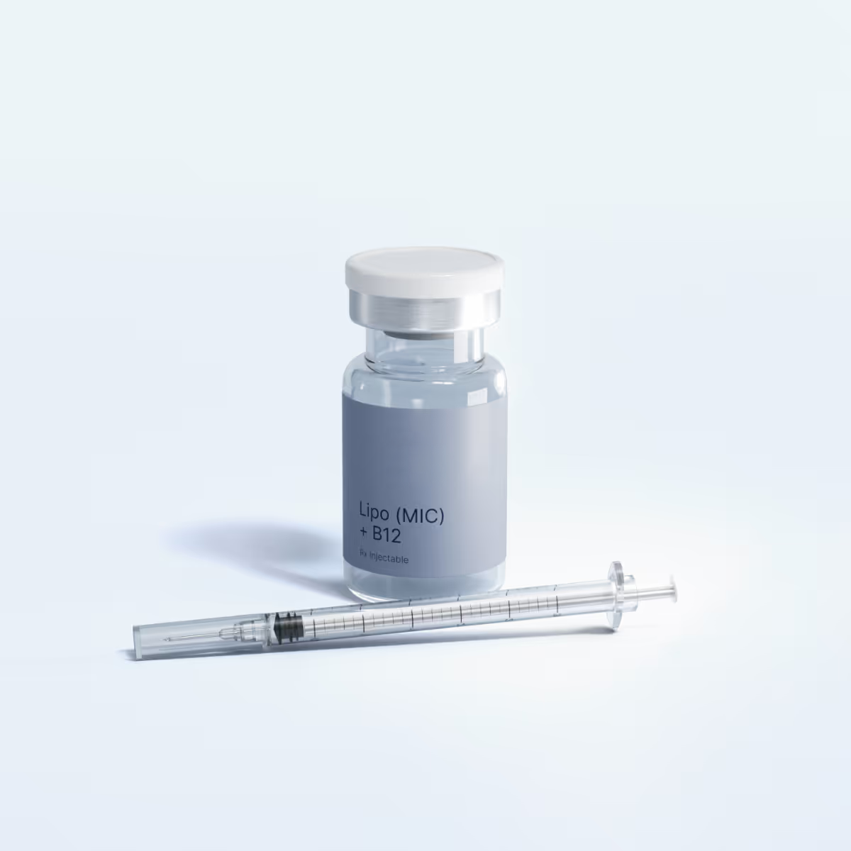 Clear vial labeled 'effecty Lipo (MIC) + B12' next to a transparent syringe on a white background.
