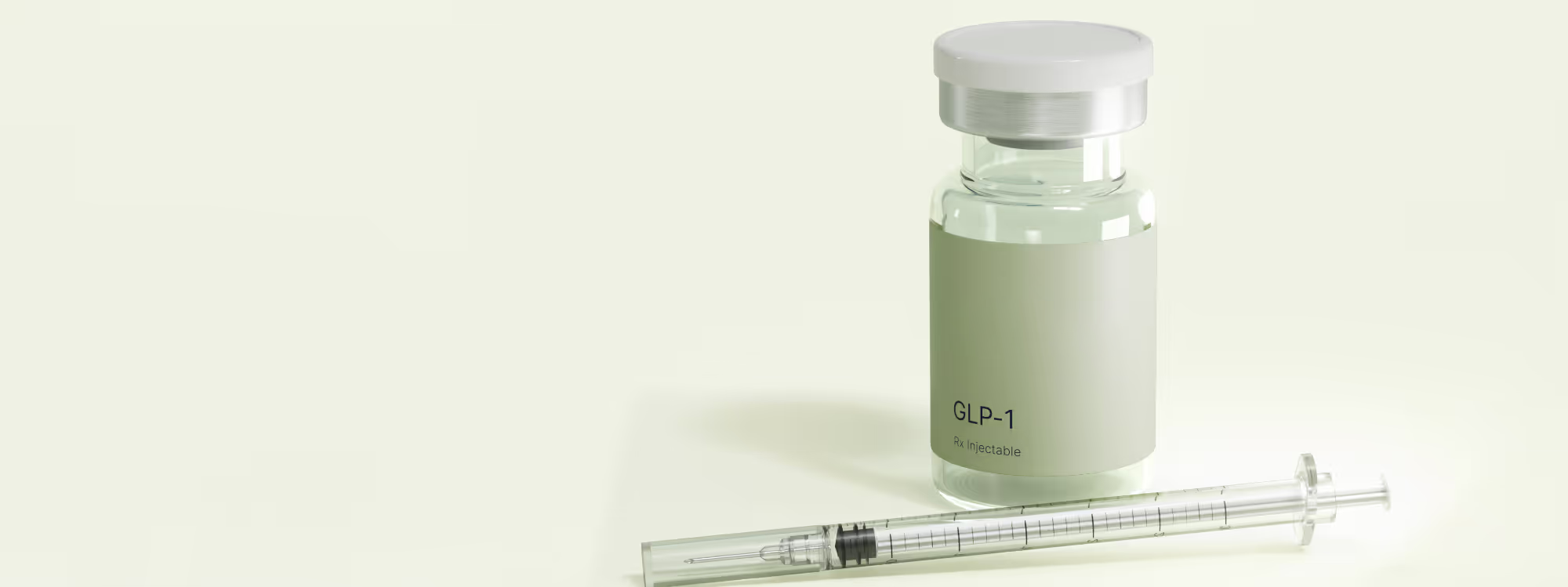 Vial labeled 'effecty GLP-1 Rx Injectable' next to a syringe on a light background.