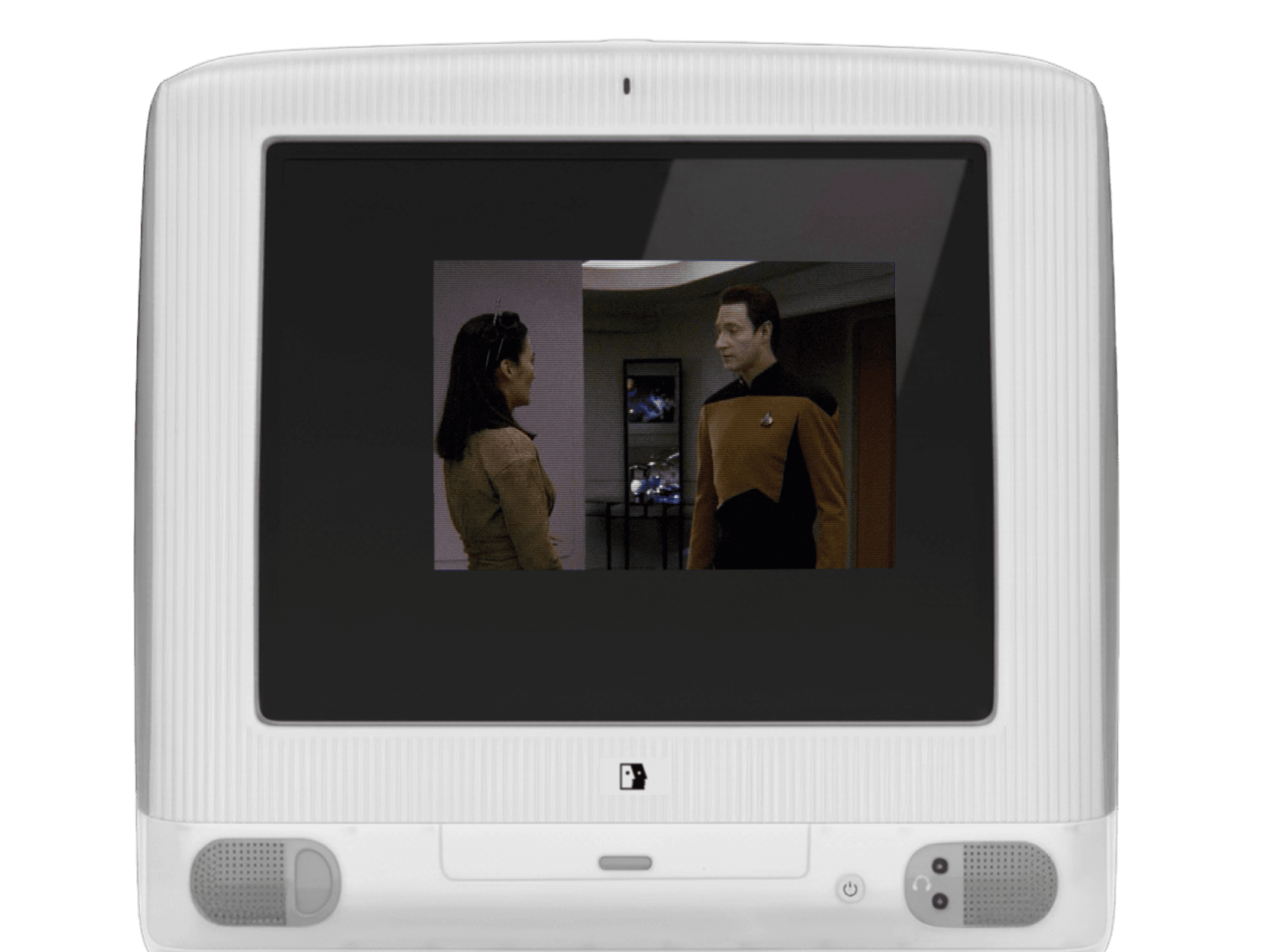 A white vintage PBS portable TV displaying a scene from Star Trek: The Next Generation where characters Data and Tasha Yar face each other inside a spaceship.