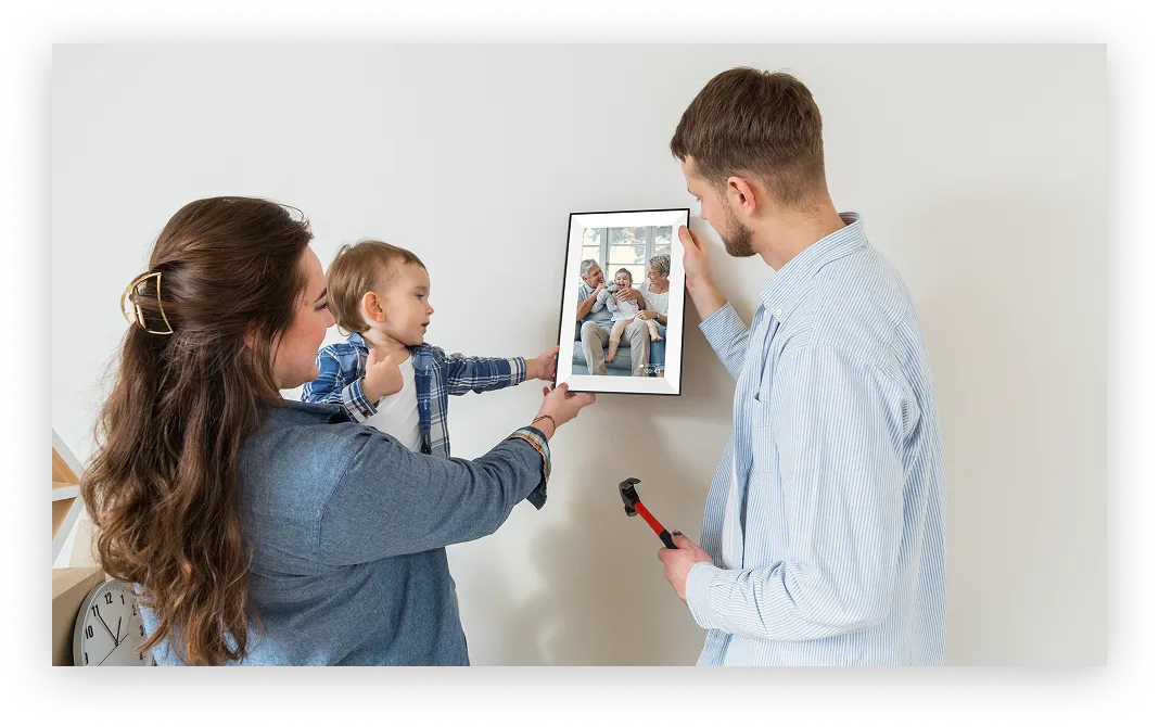 A family sharing memories on a Whale Framely Photo frame