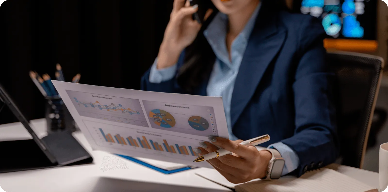 Expert checking clients financial records dring a call with them