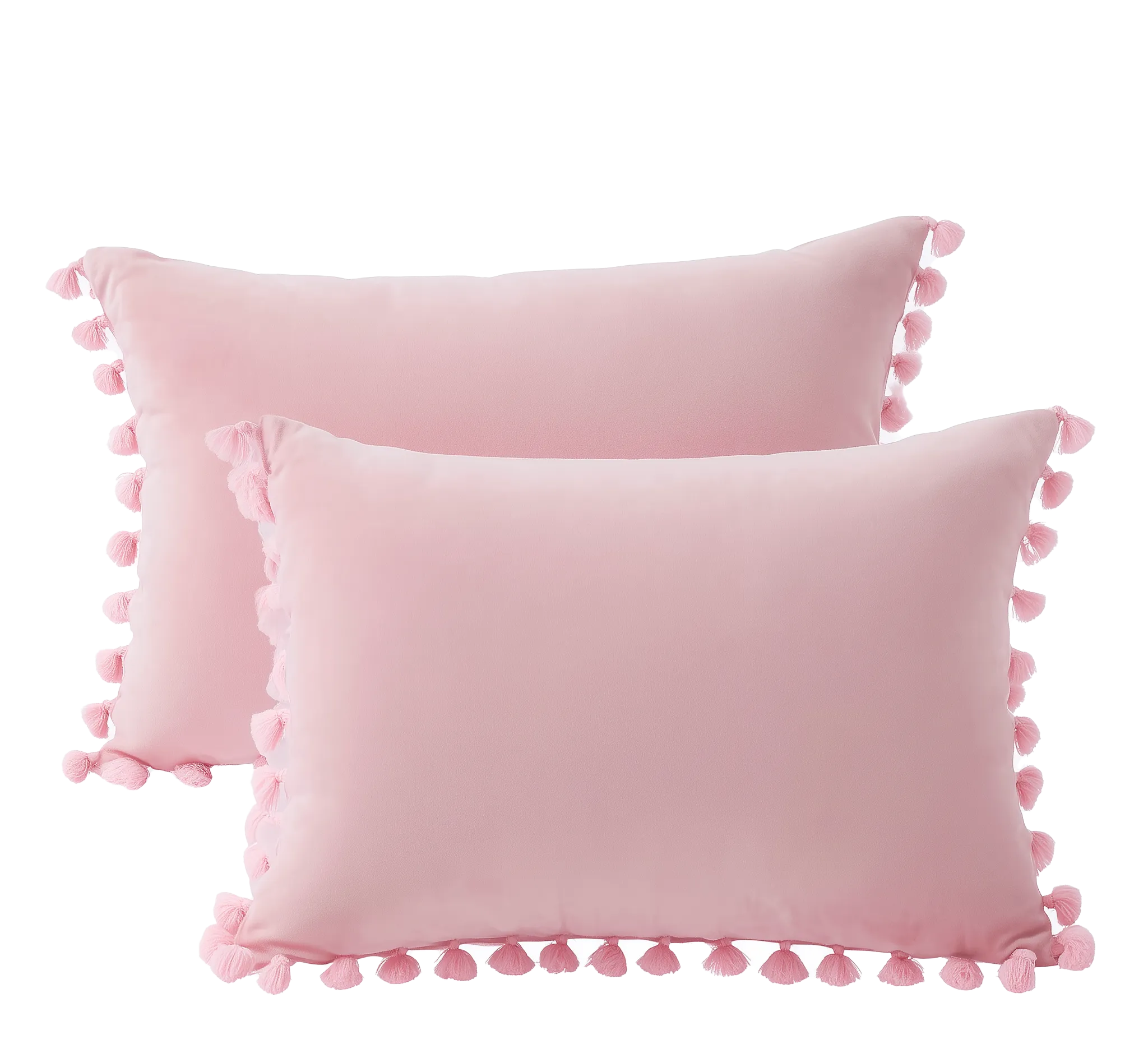 Two pink pillows with pom poms on them.