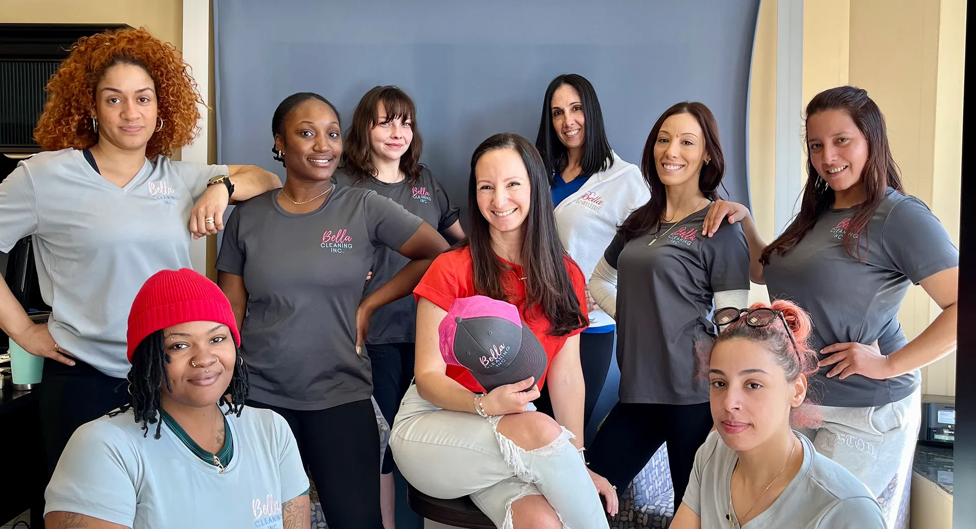 A group of women standing next to each other.