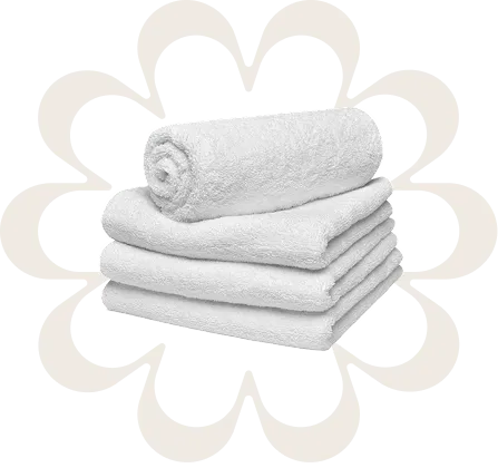 A stack of white towels sitting on top of each other.