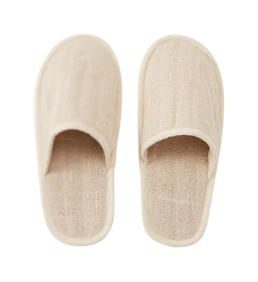 A pair of slippers on a black background.