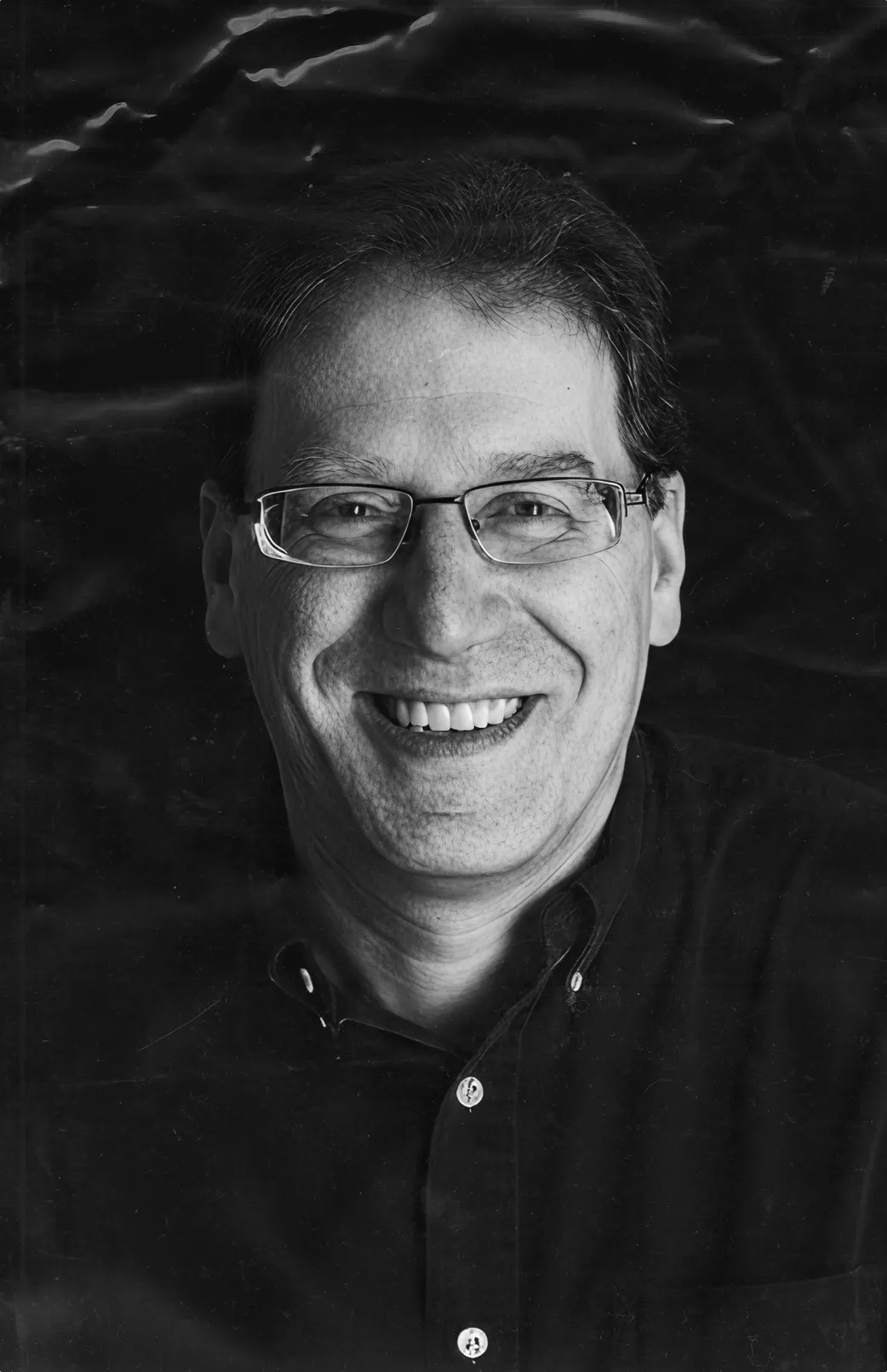 Team member headshot in black and white