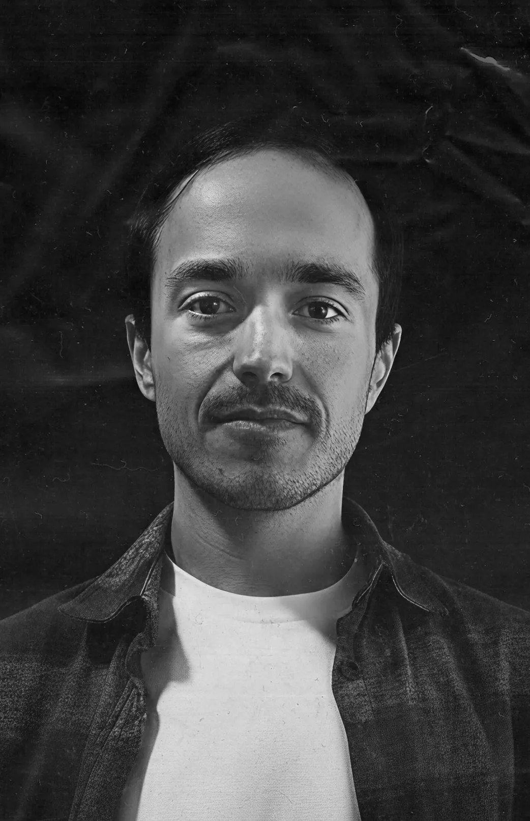 Team member headshot in black and white